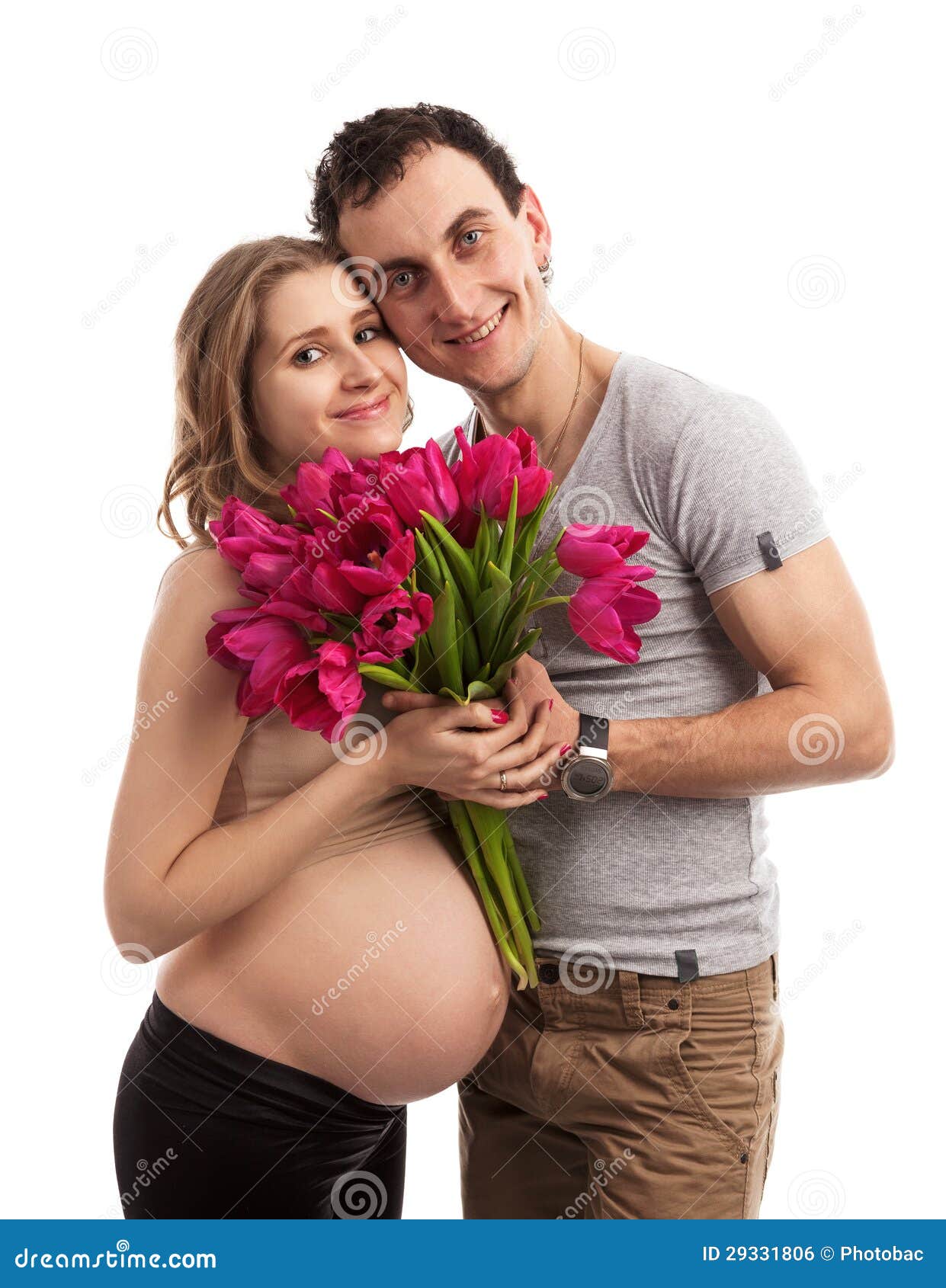 Retrato De Los Pares Embarazadas Jovenes Que Sostienen Las Flores Foto de  archivo - Imagen de esperar, embarazo: 29331806