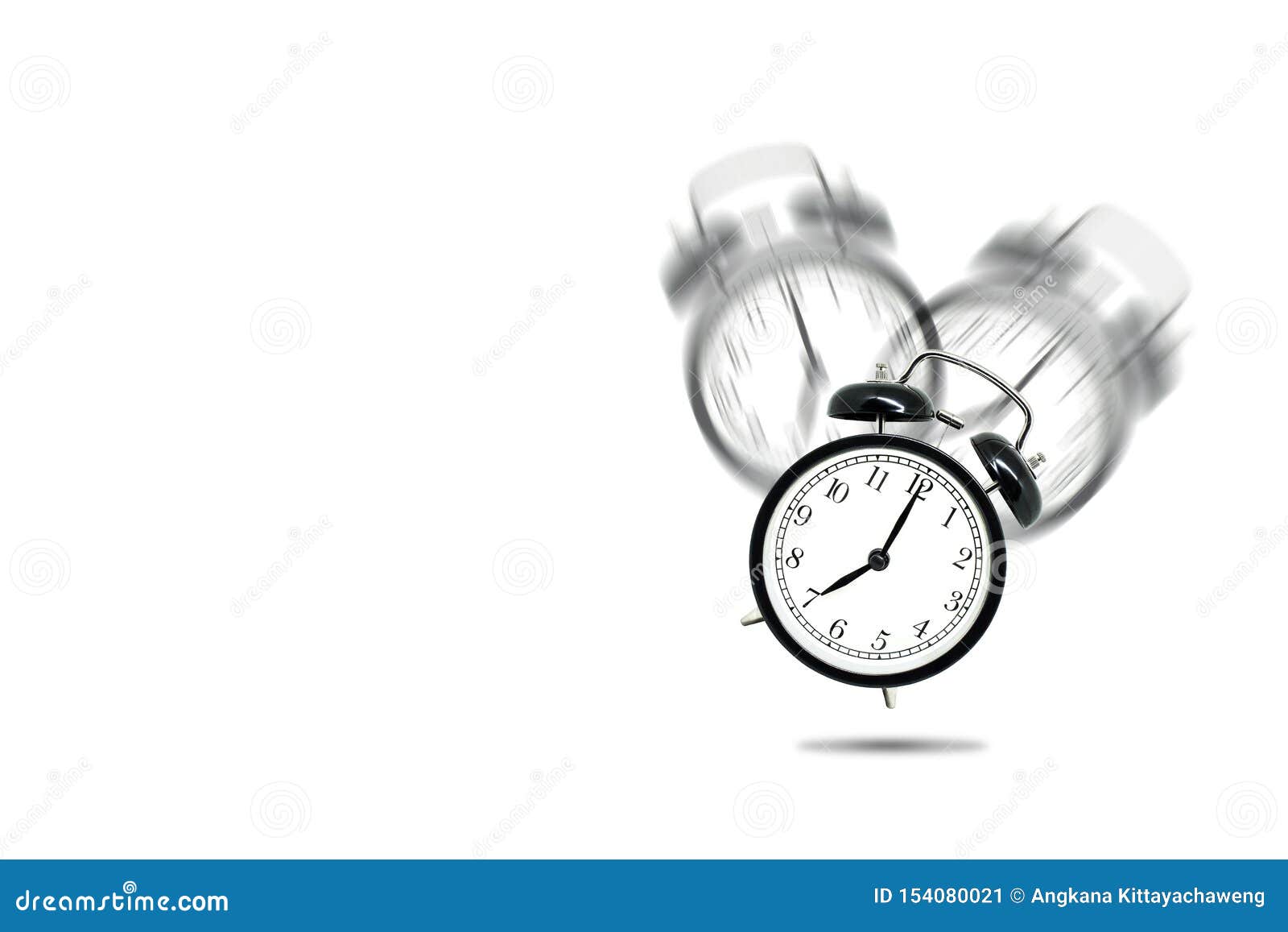 retro black alarm clock alerting at seven o`clock on white background.
