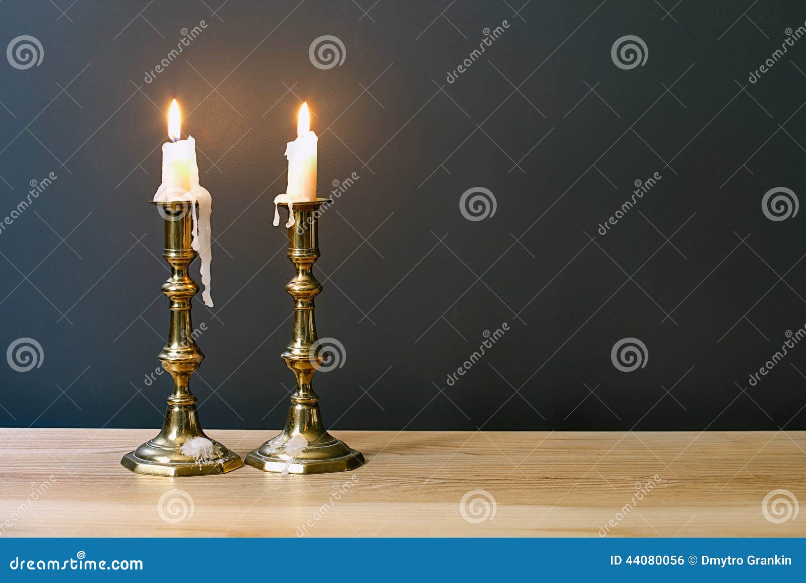 retro candelabra with burning candles in minimalist room