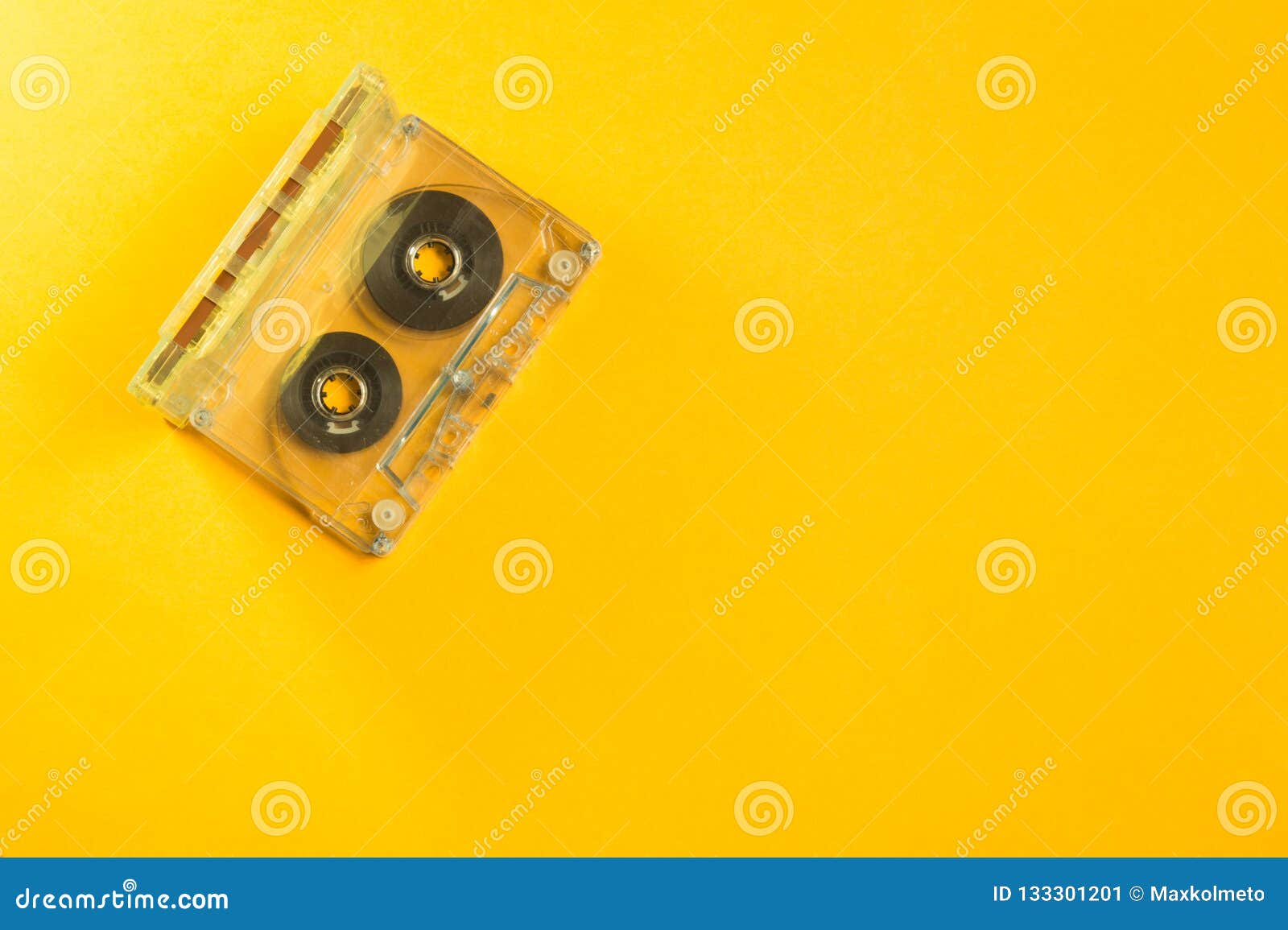 Retro Cassette Tape on the Yellow Background. Copy Space Stock Image