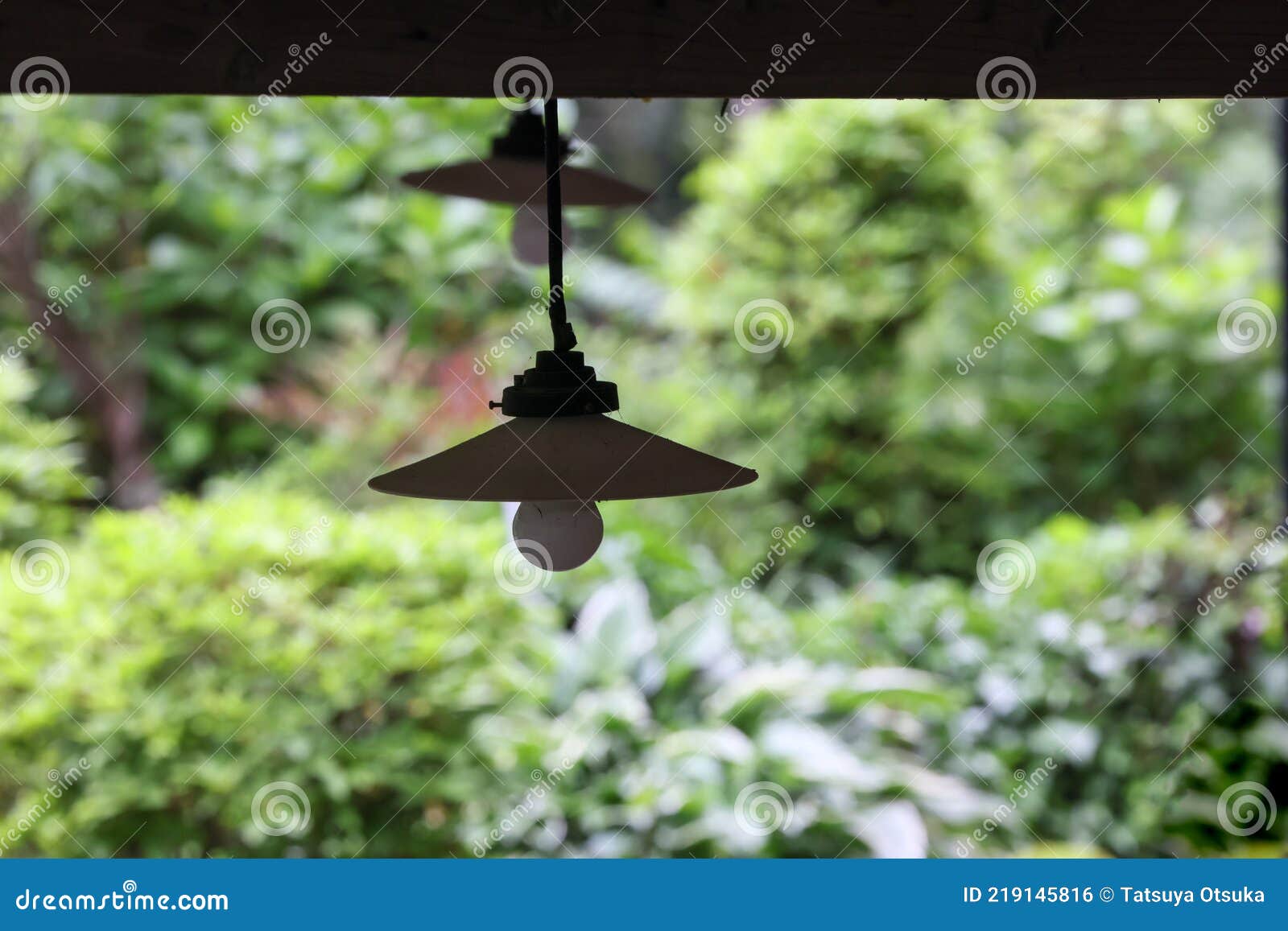 Retro Electric Lights Hanging from the Eaves Stock Photo Image of