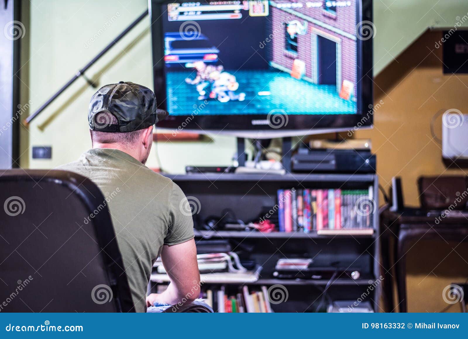 retro gamer in front of the tv