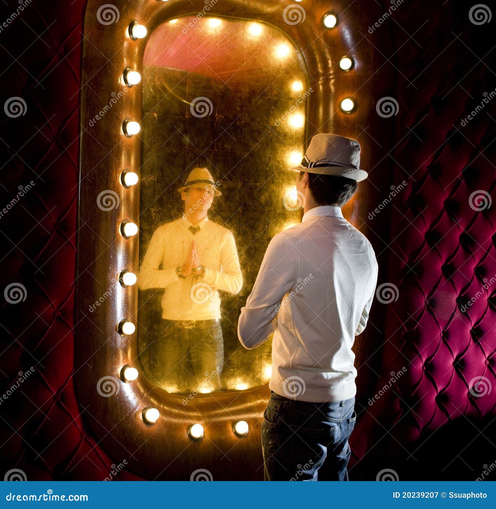 retro man looks on mirror