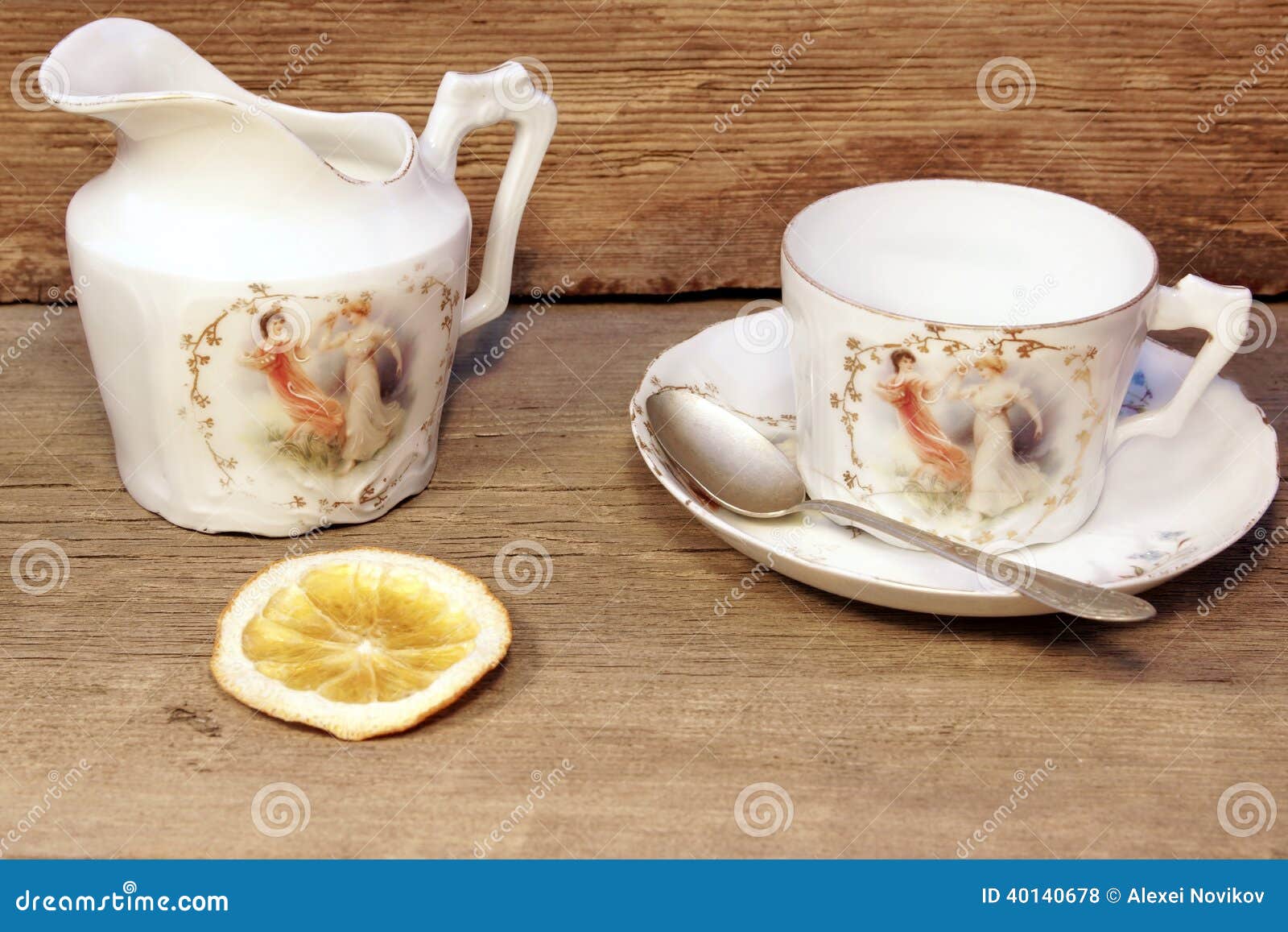 Retro Porcelain Tea Cup and Plate with Silver Spoon Stock Photo Image