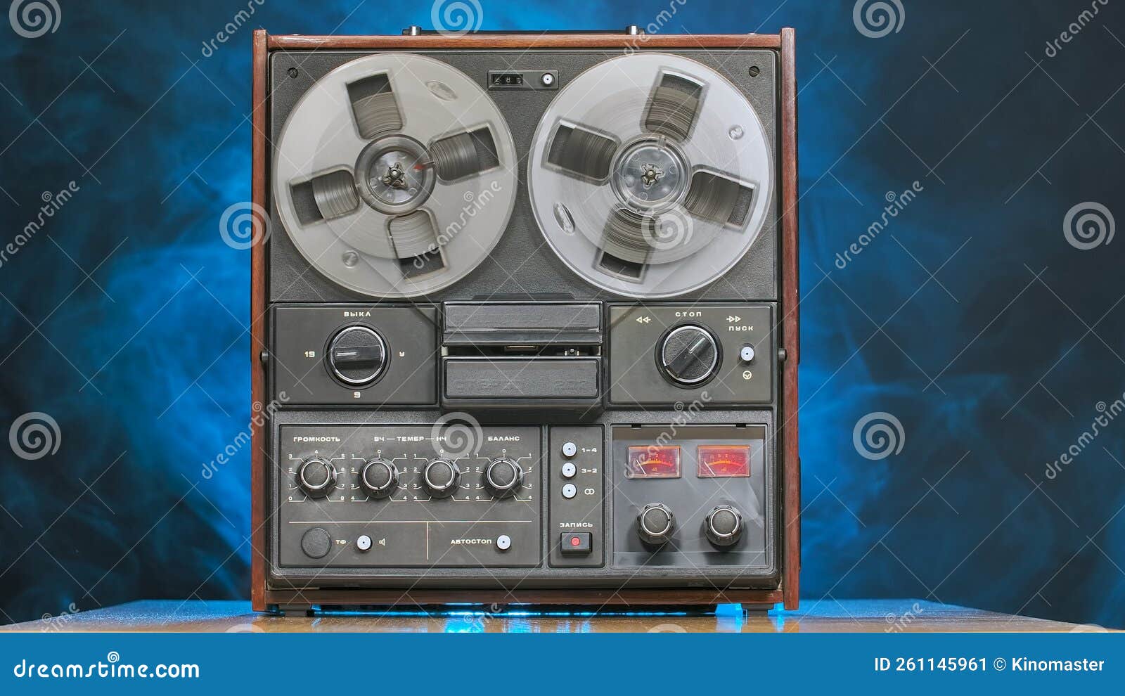 https://thumbs.dreamstime.com/z/retro-reel-to-tape-recorder-studio-background-blue-light-smoke-vintage-music-player-old-plastic-bobbins-buttons-knobs-261145961.jpg