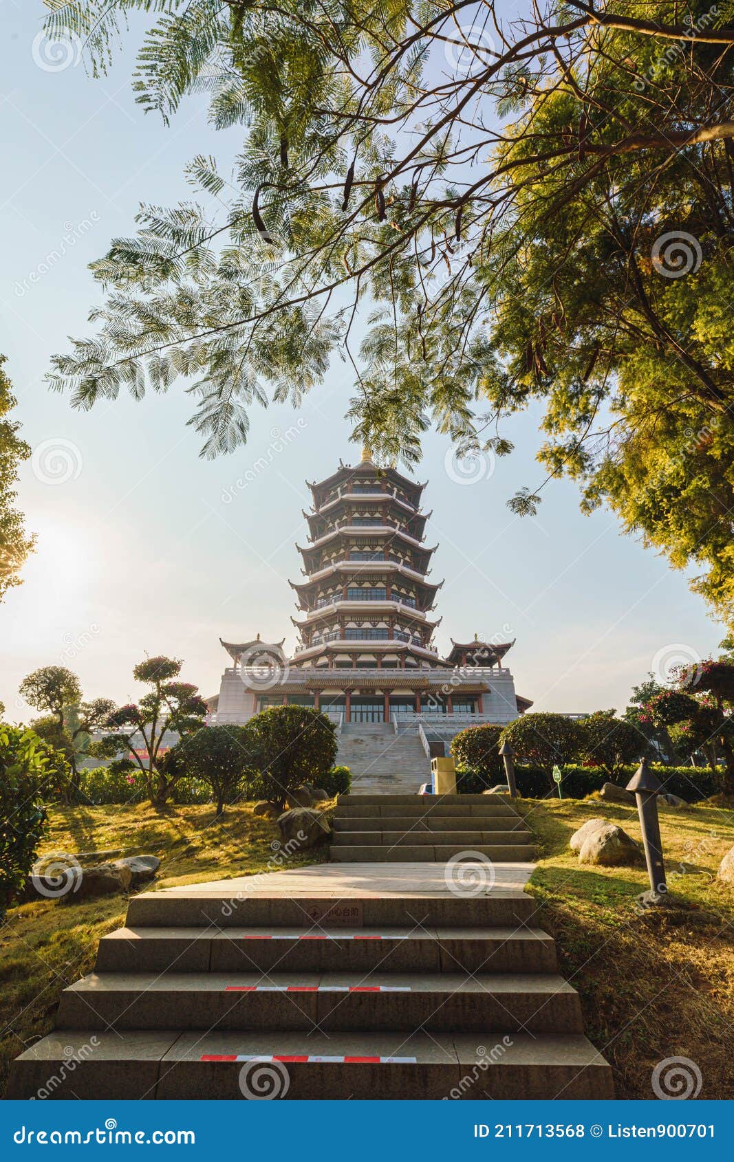 a retro style traditional chinese pagoda tower, the jimei tower in the civic park in jimei district, xiamen, china