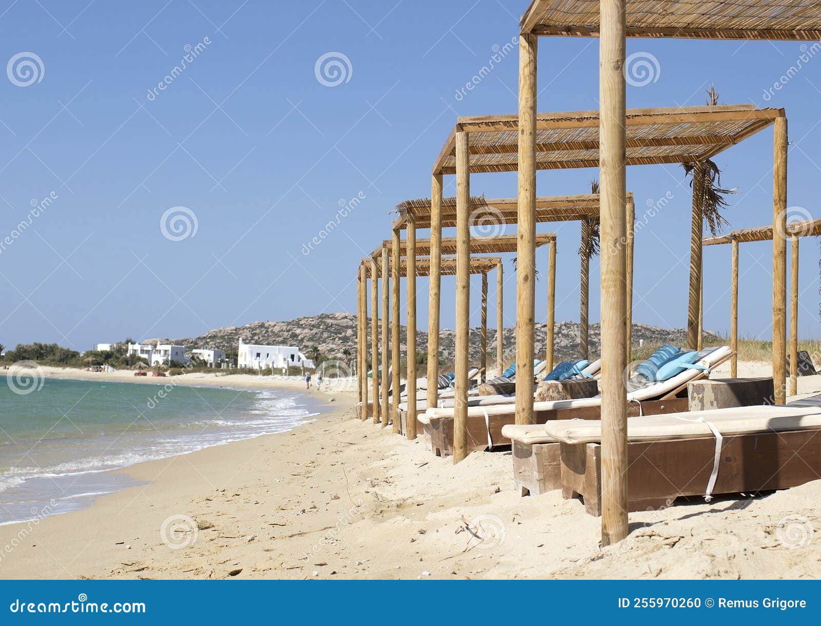 Retro sunbeds on the beach stock photo. Image of reed 255970260