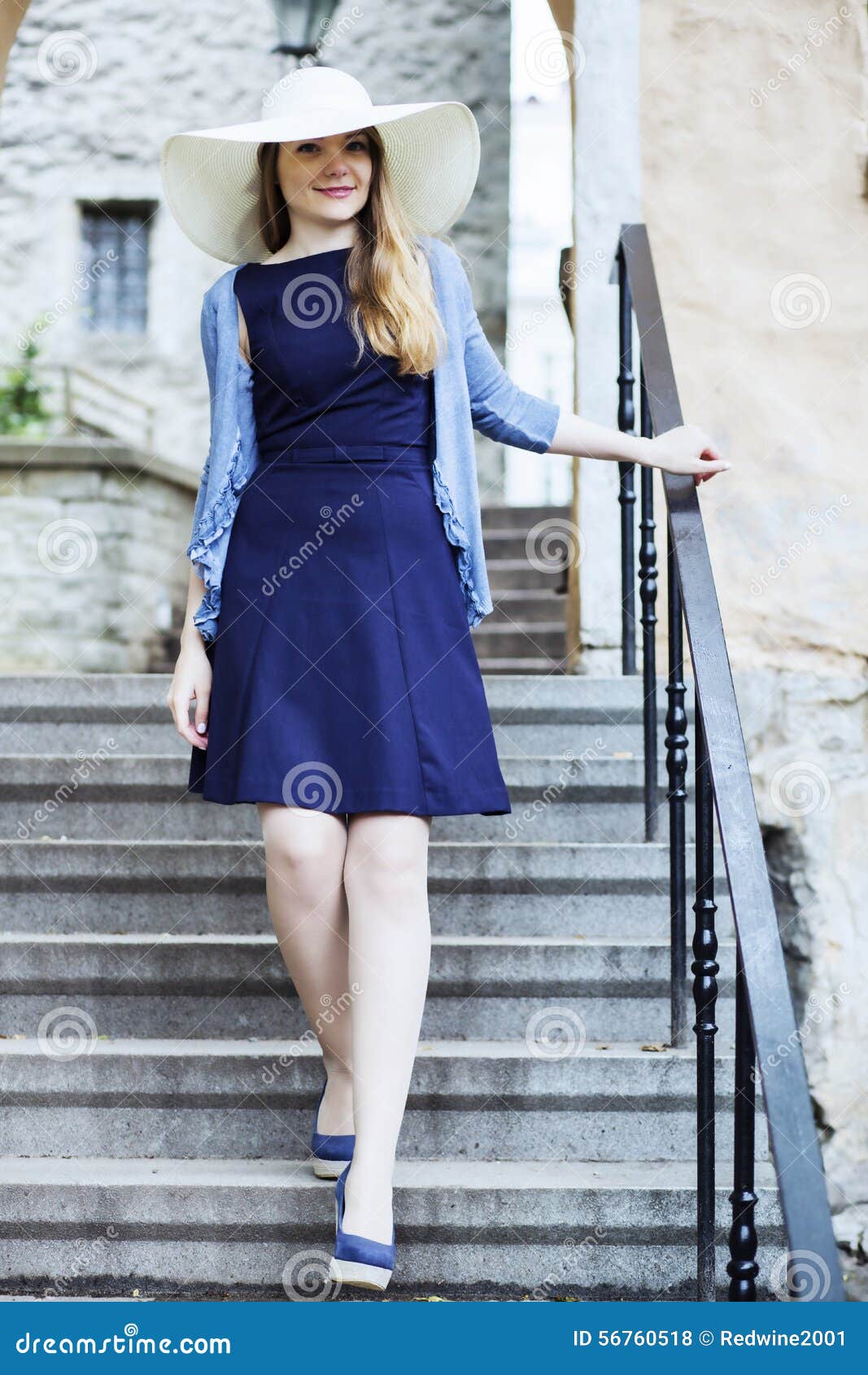 retro woman is exploring the medieval town