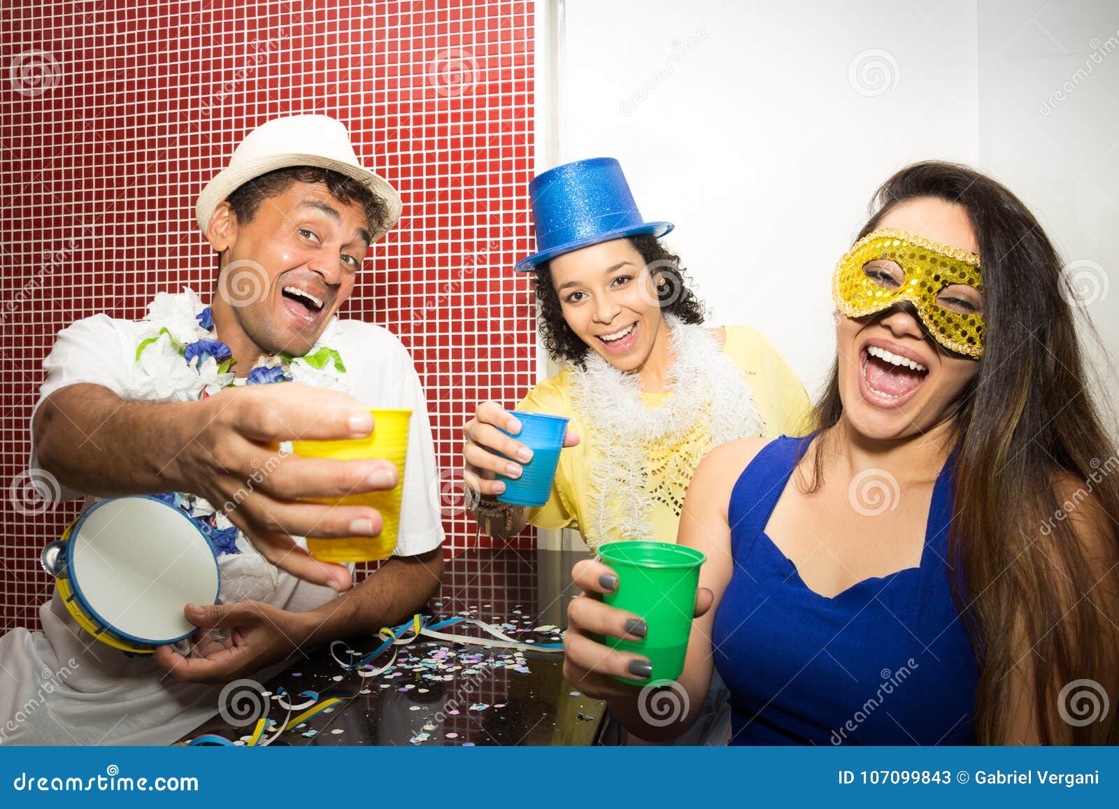 revelers making funny photo. group of friends celebrate the carnaval in brazil..