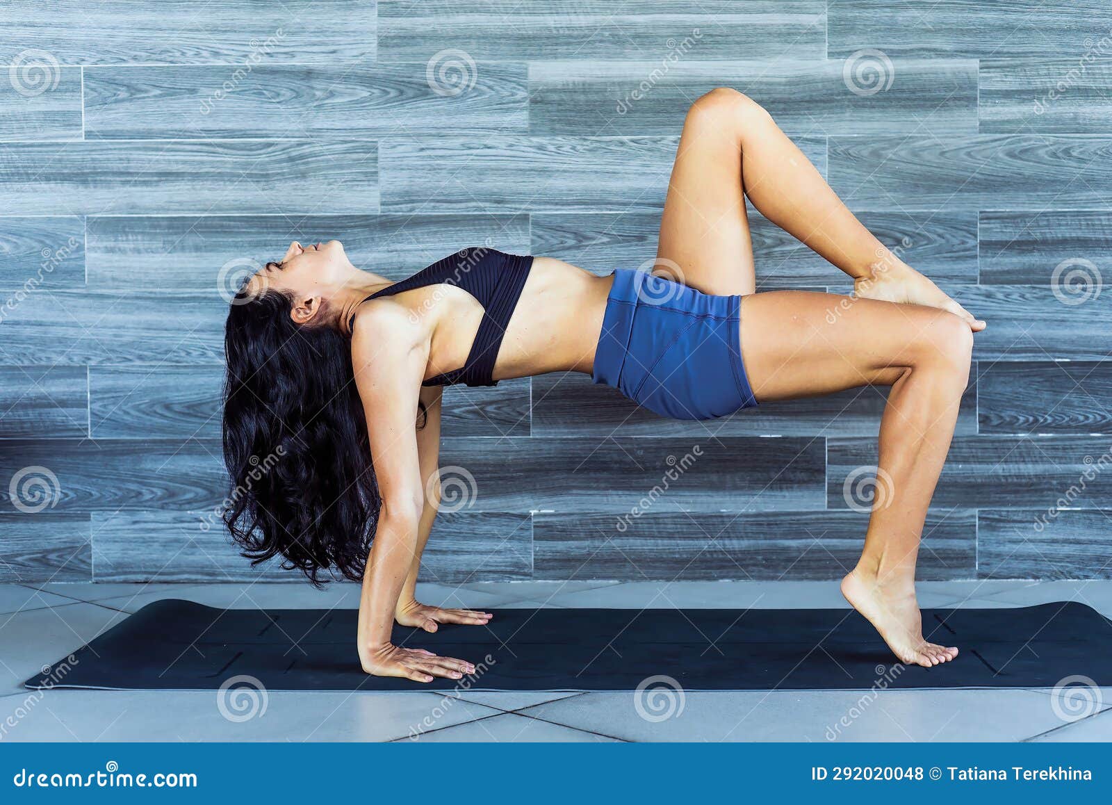 reverse table pose variation ardha purvottasana yoga with ukrainian woman making it indoors