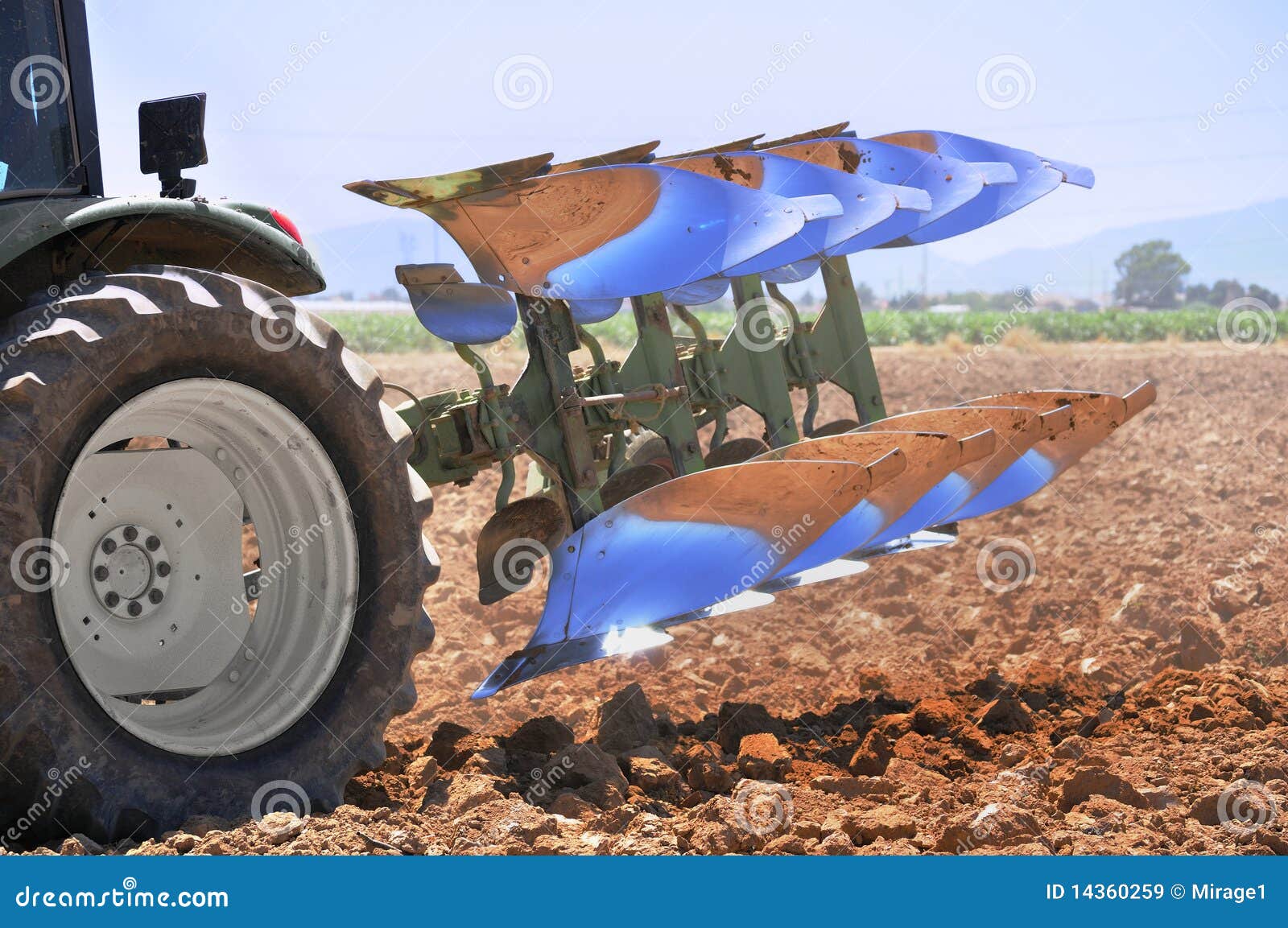 reversible plough on a tractor