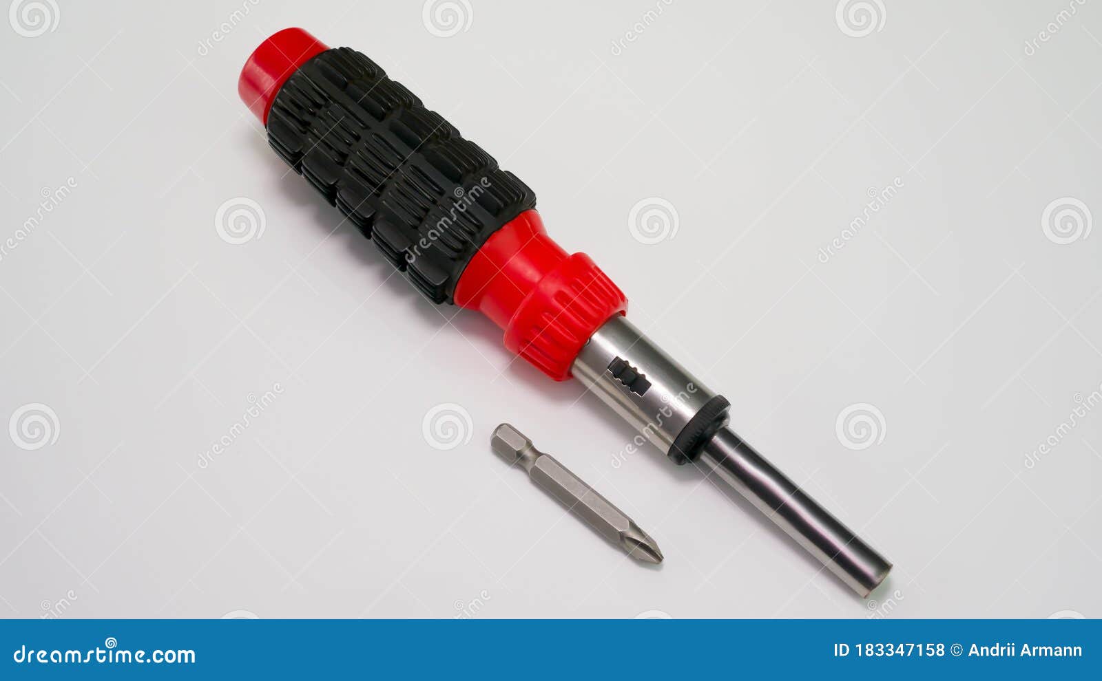 Reversible Screwdriver with Nozzle. on a White Background. Universal