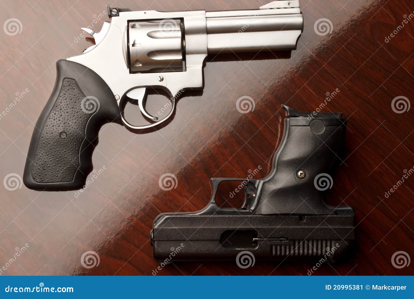 Revolver vs Handgun stock image. Image of body, action 20995381