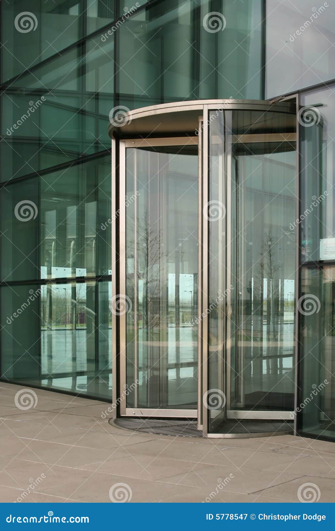 Revolving glass door stock image. Image of architecture 5778547