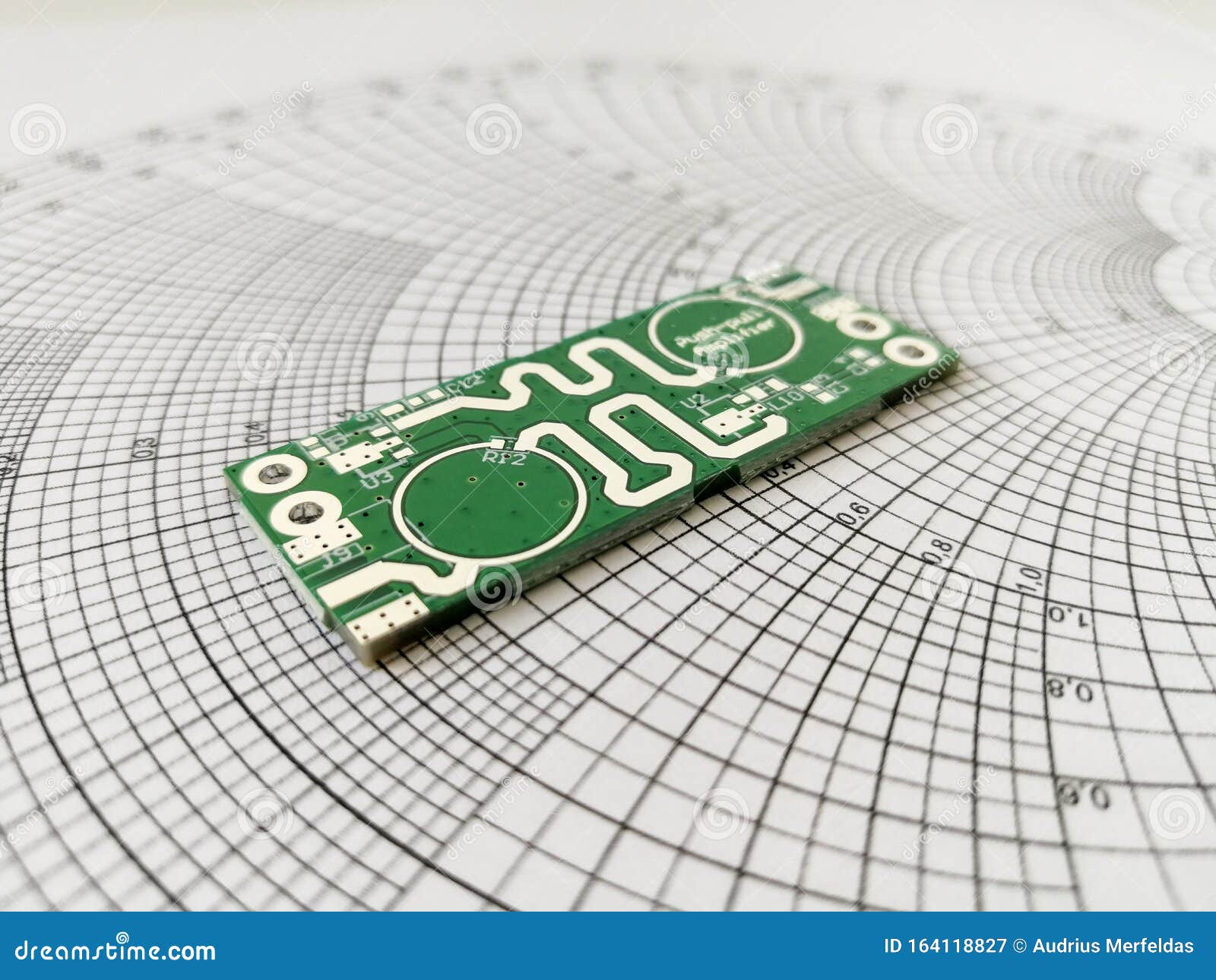 rf pcb in front of smith chart