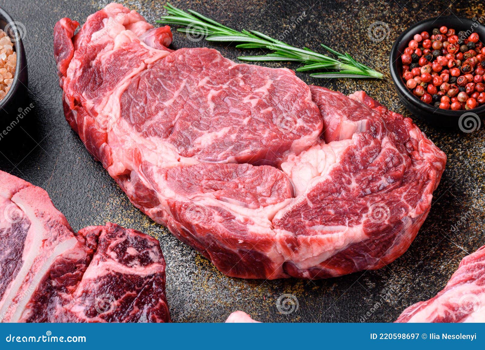 Rib Eye Beef Steak Raw, on Old Dark Rustic Background Stock Image ...