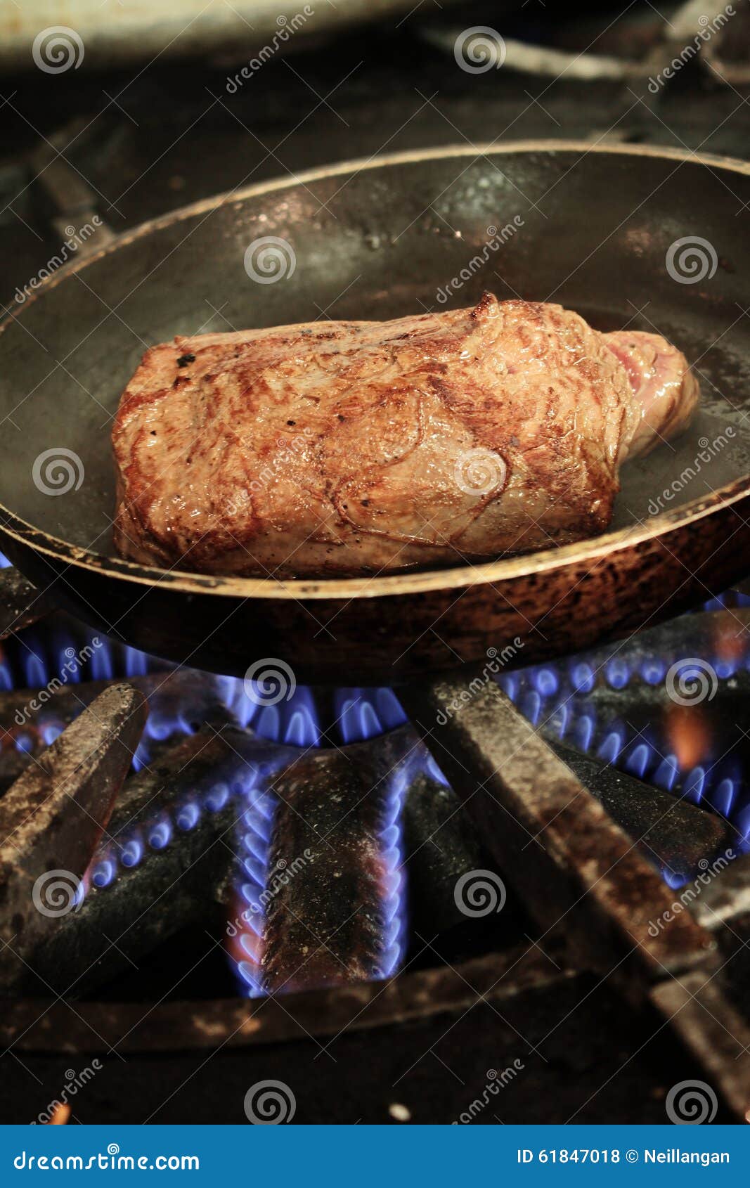 Rib Eye Steak Cooking on Stove Stock Photo Image of aged, fillet