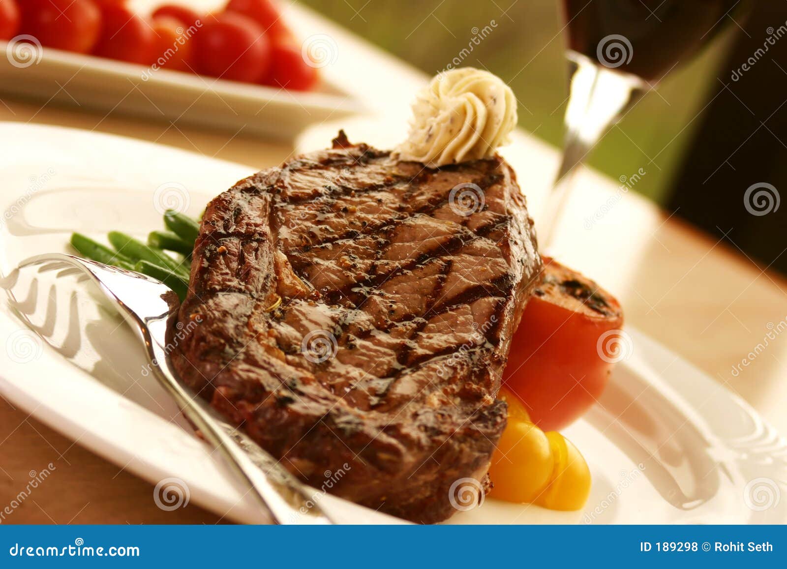 Rib Eye Steak Served with Wine Stock Photo Image of butter, lunch 189298