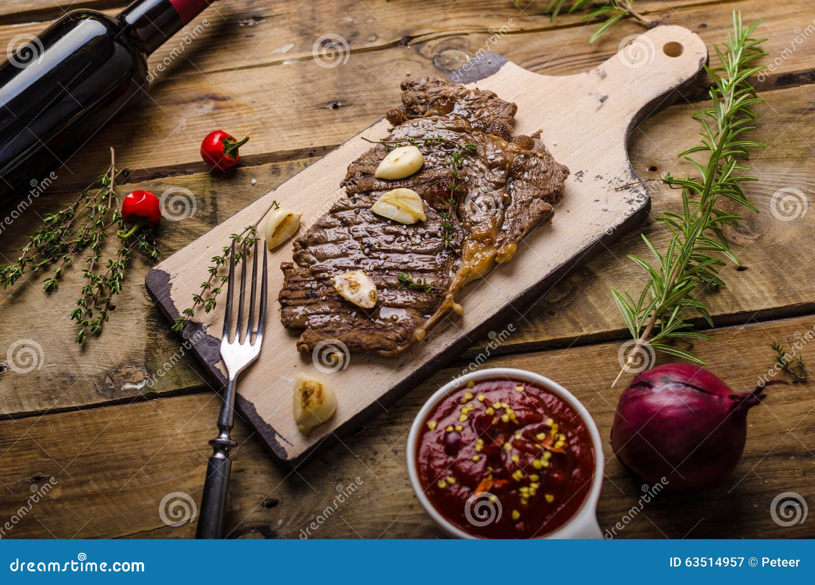 Rib eye steak with wine stock image. Image of cooked 63514957