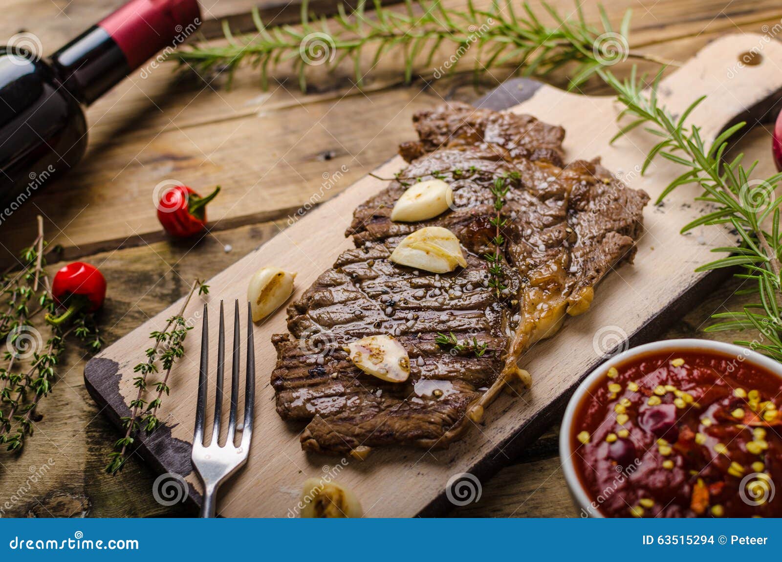 Rib eye steak with wine stock photo. Image of gourmet 63515294