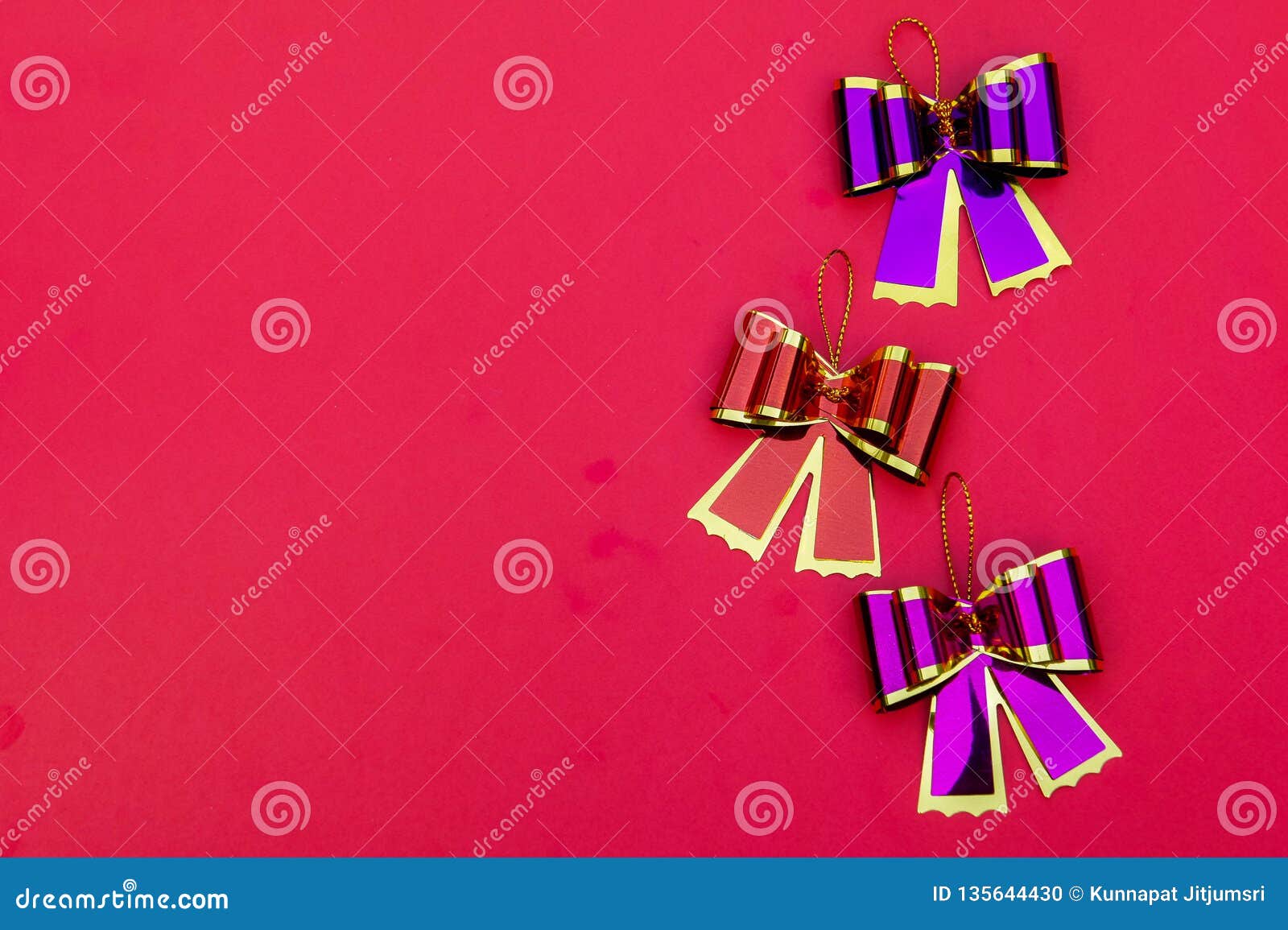 ribbon bow on red background , geeting card and copy space