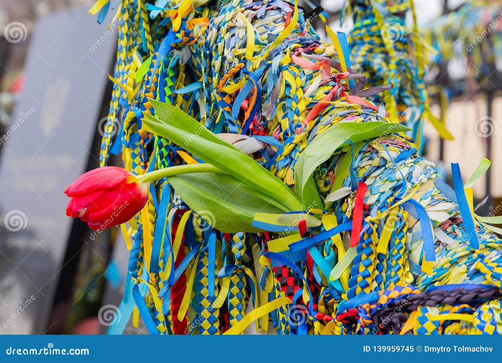 ribbons and flowers at the memorial to the fallen heroes of euromaidan on the anniversary of the events. kiev