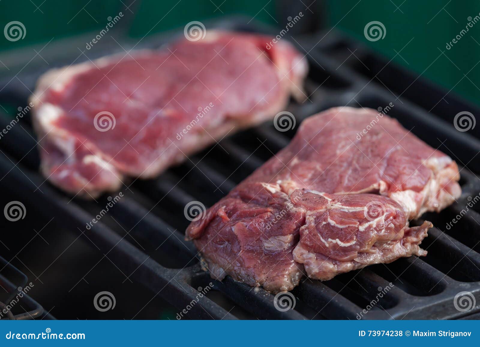 Ribeye steak on a grill stock photo. Image of juicy, grill 73974238