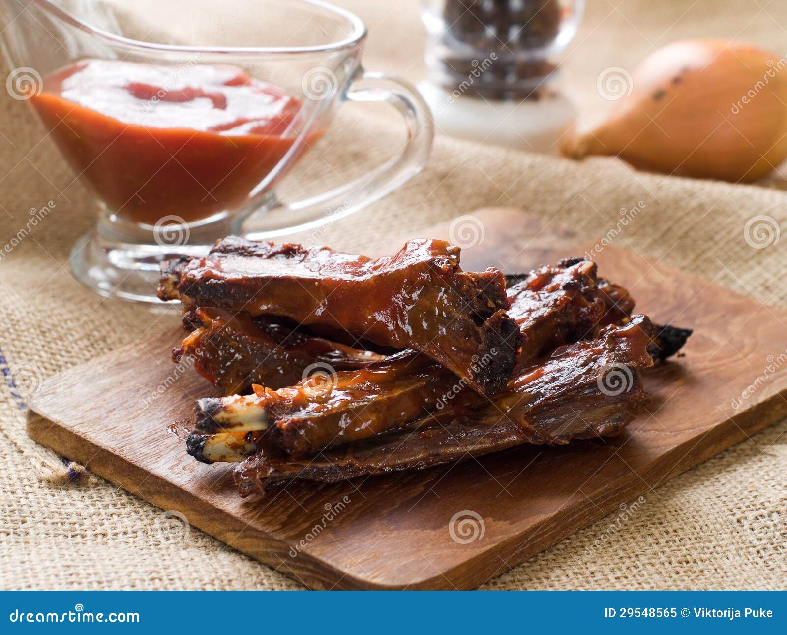 Ribs with tomato sauce stock image. Image of board, food 29548565