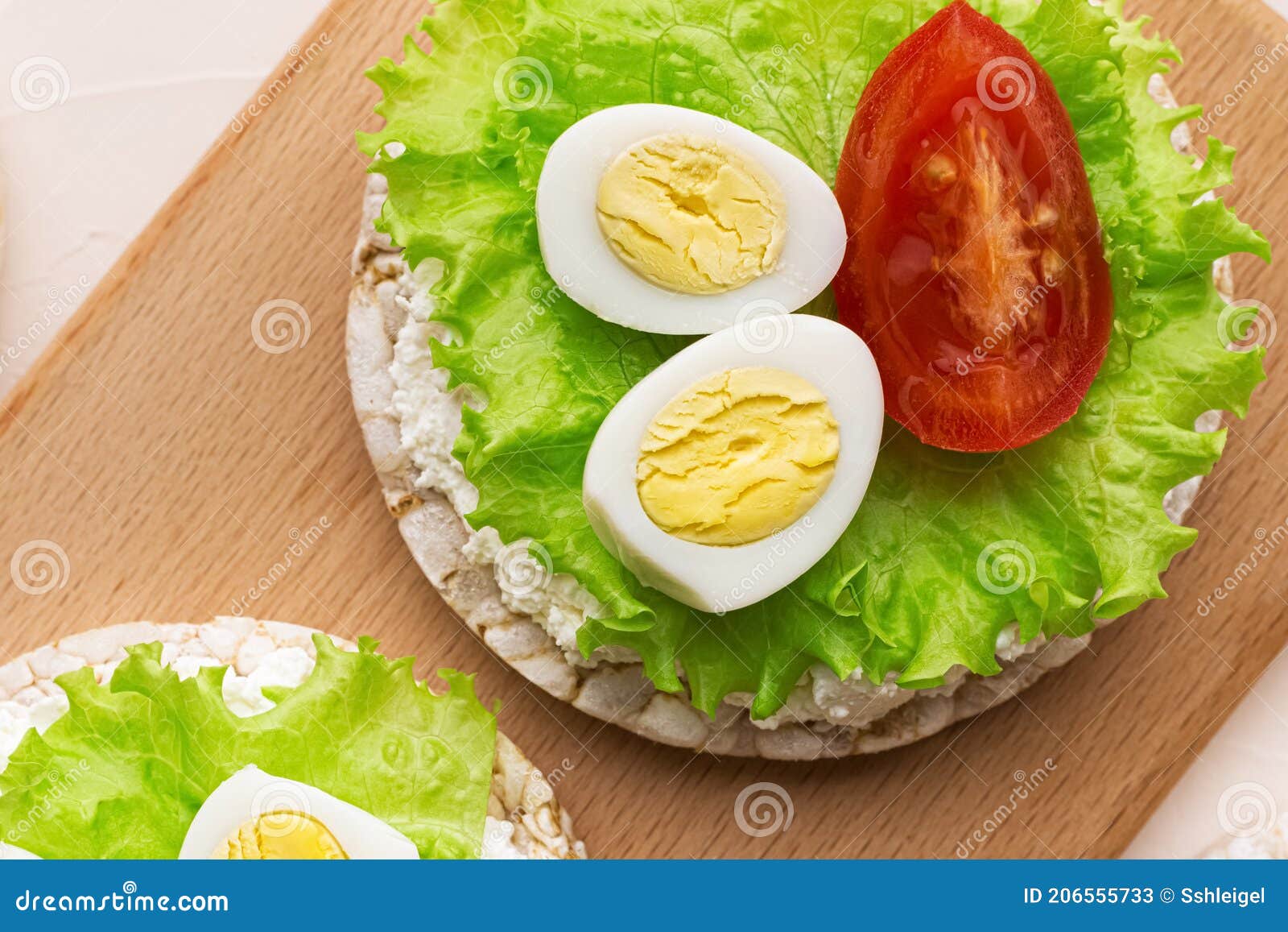 Rice Cakes with Cream Cheese and Quail Eggs with Lettuce and Tomato Top