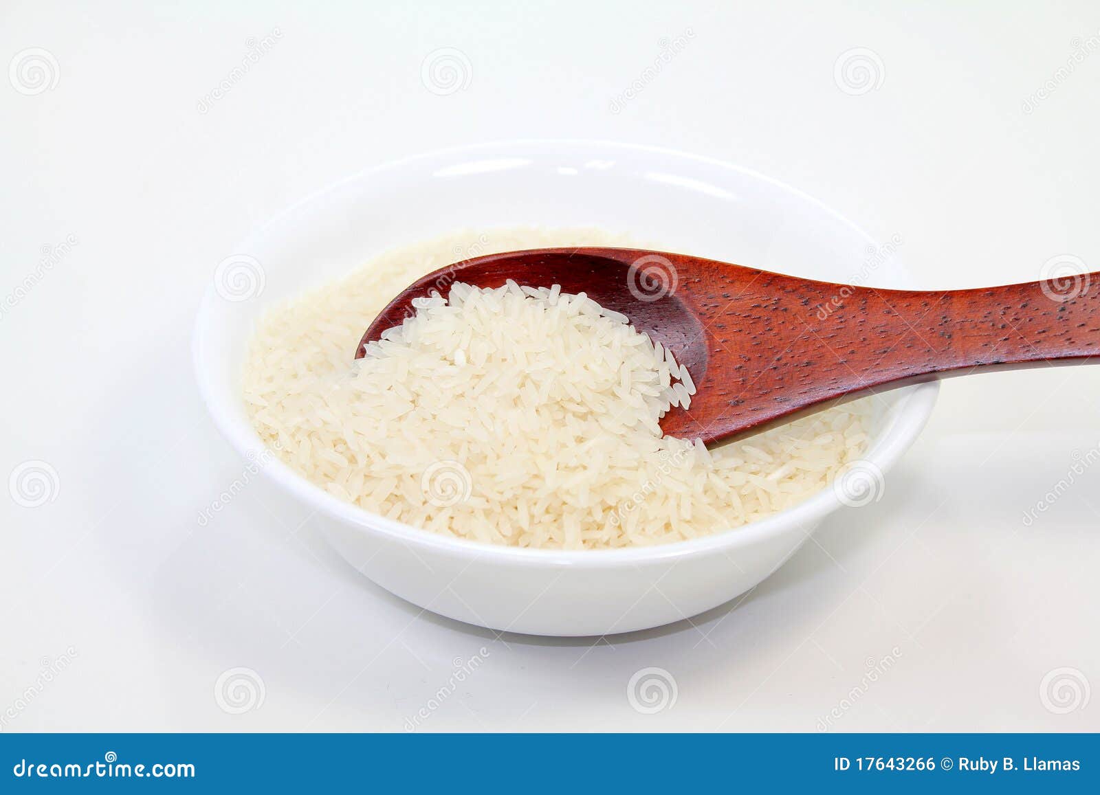 Rice Grains in White Bowl stock photo. Image of bowl 17643266