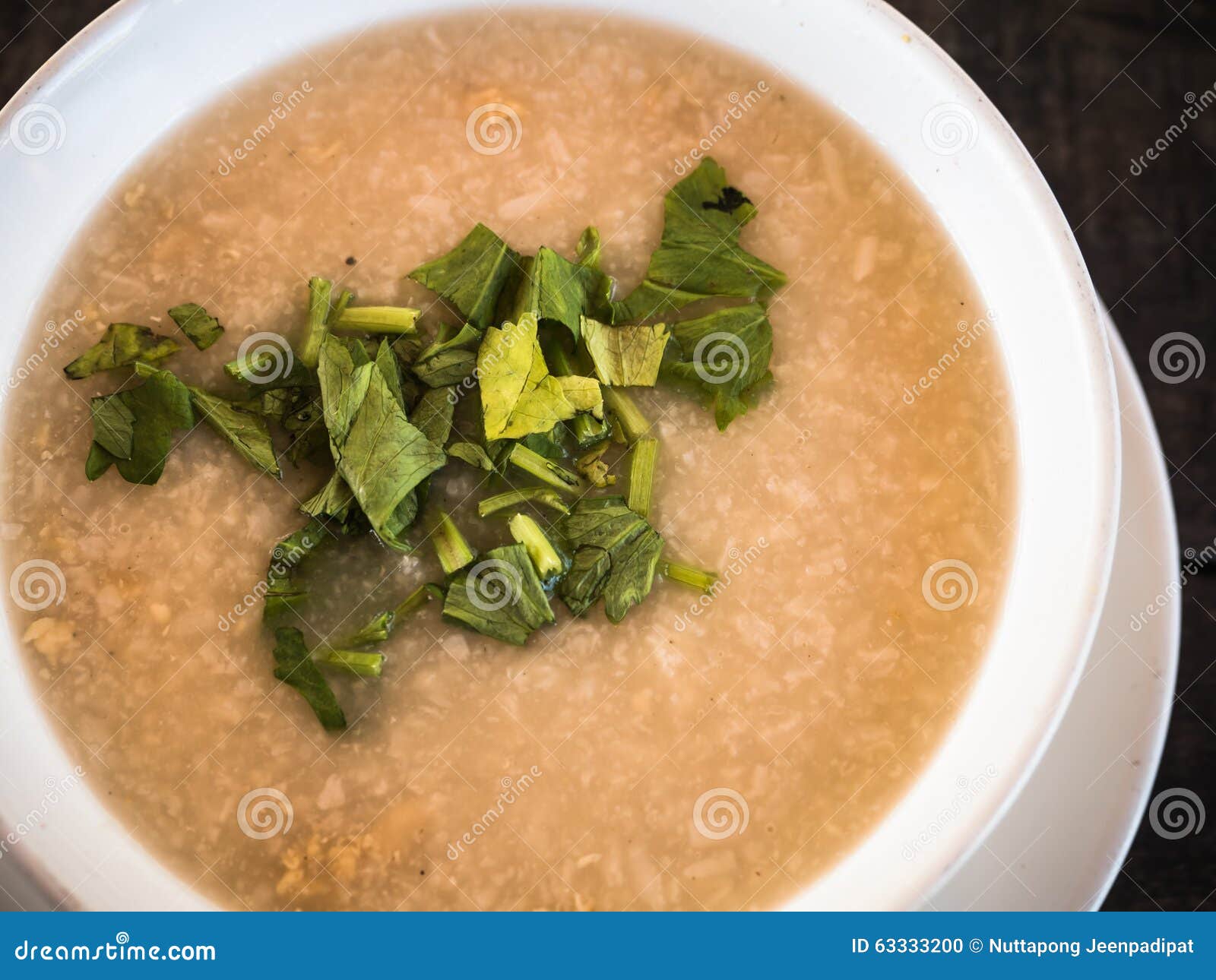 Rice gruel in bowl stock photo. Image of bowl, lemon - 63333200