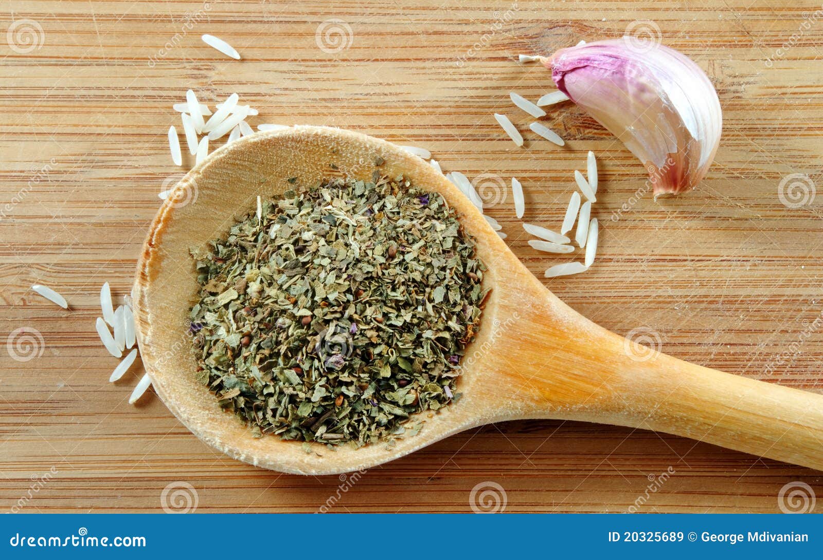 Rice and herbs stock image. Image of cooking, board, garlic 20325689
