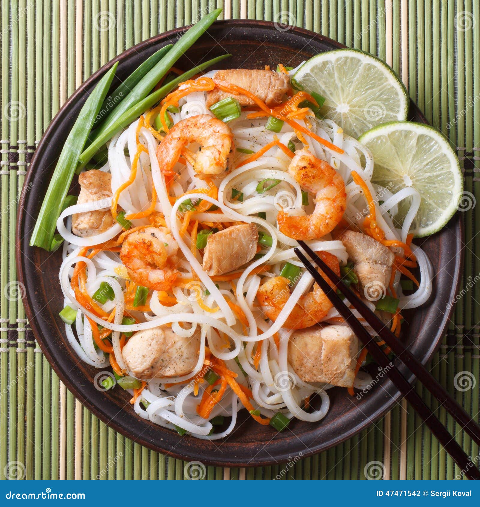 Rice Noodles with Chicken, Shrimp and Vegetables Closeup Stock Photo