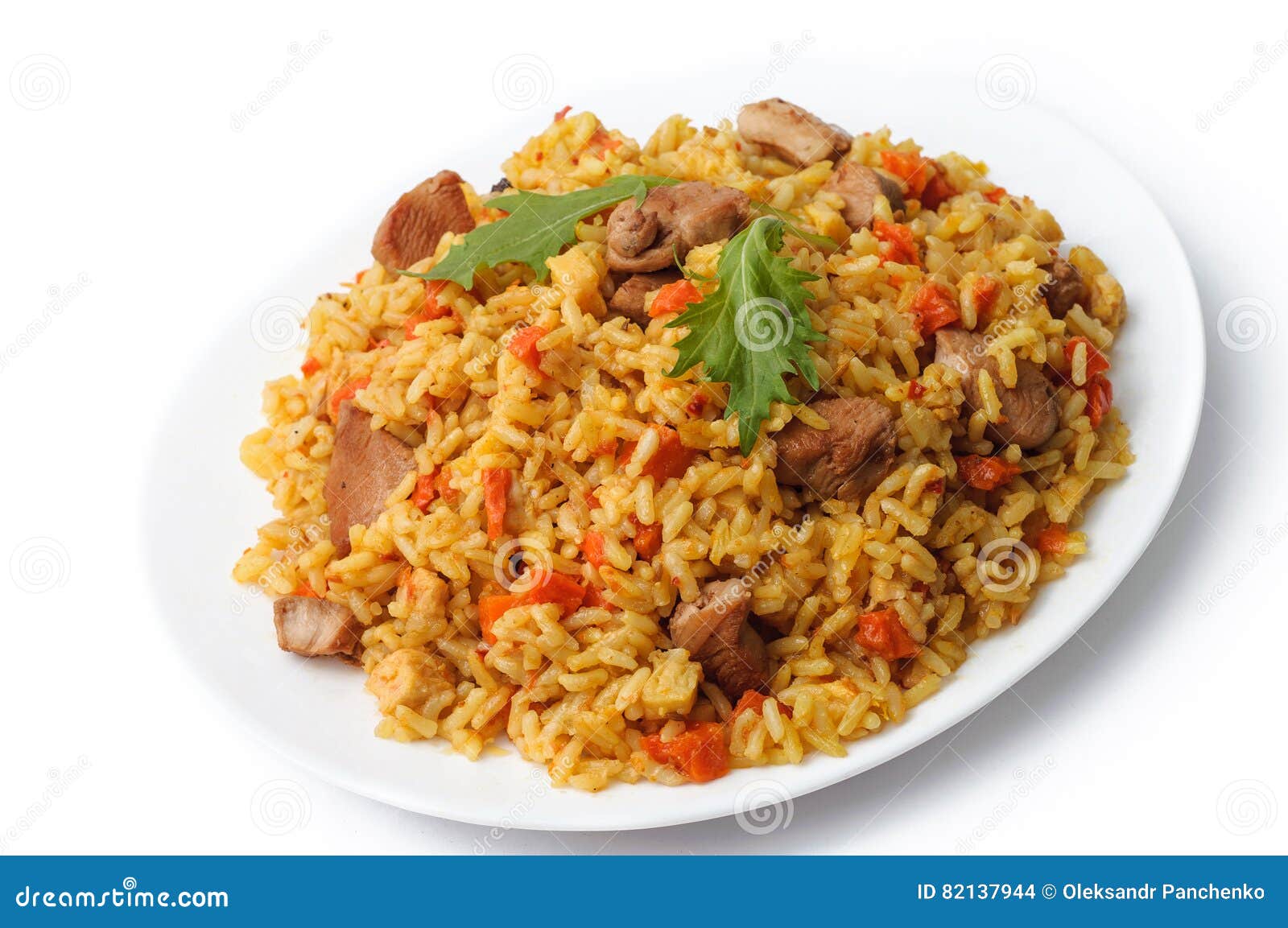Rice Pilaf with Meat and Vegetables Top View on a Plate. Isolate Stock