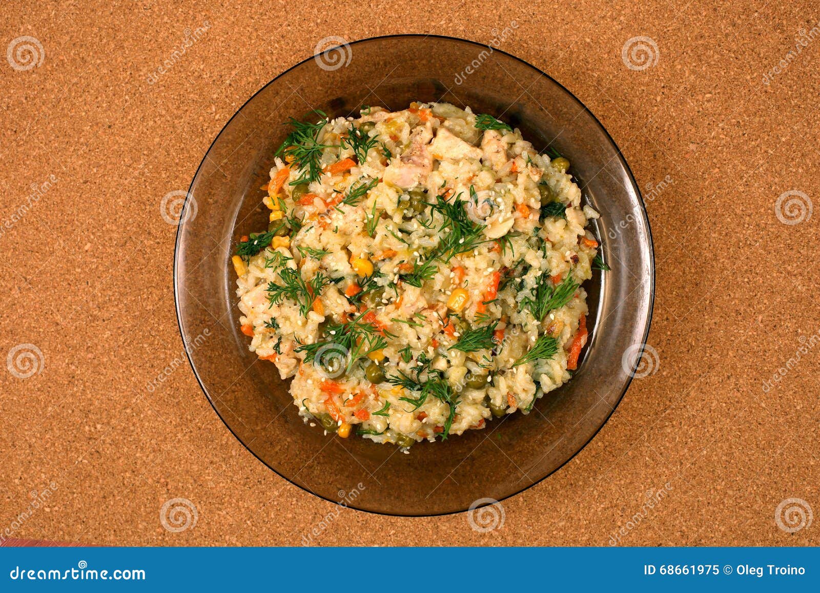 Rice Pilaf with Peas and Corn in a Plate on the Table Stock Image