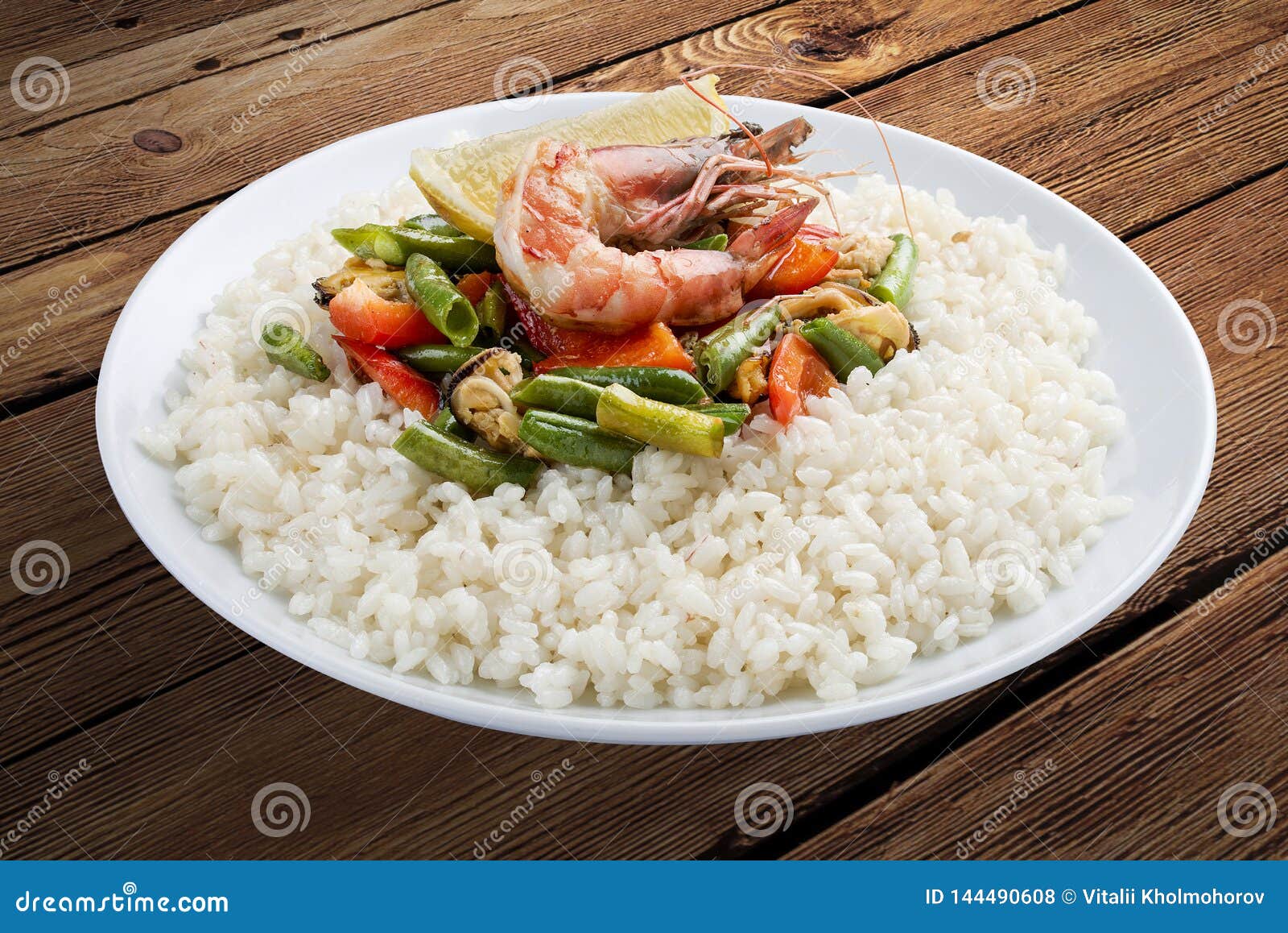 Rice Porridge with Shrimps and Vegetables. on a Wooden Background Stock ...