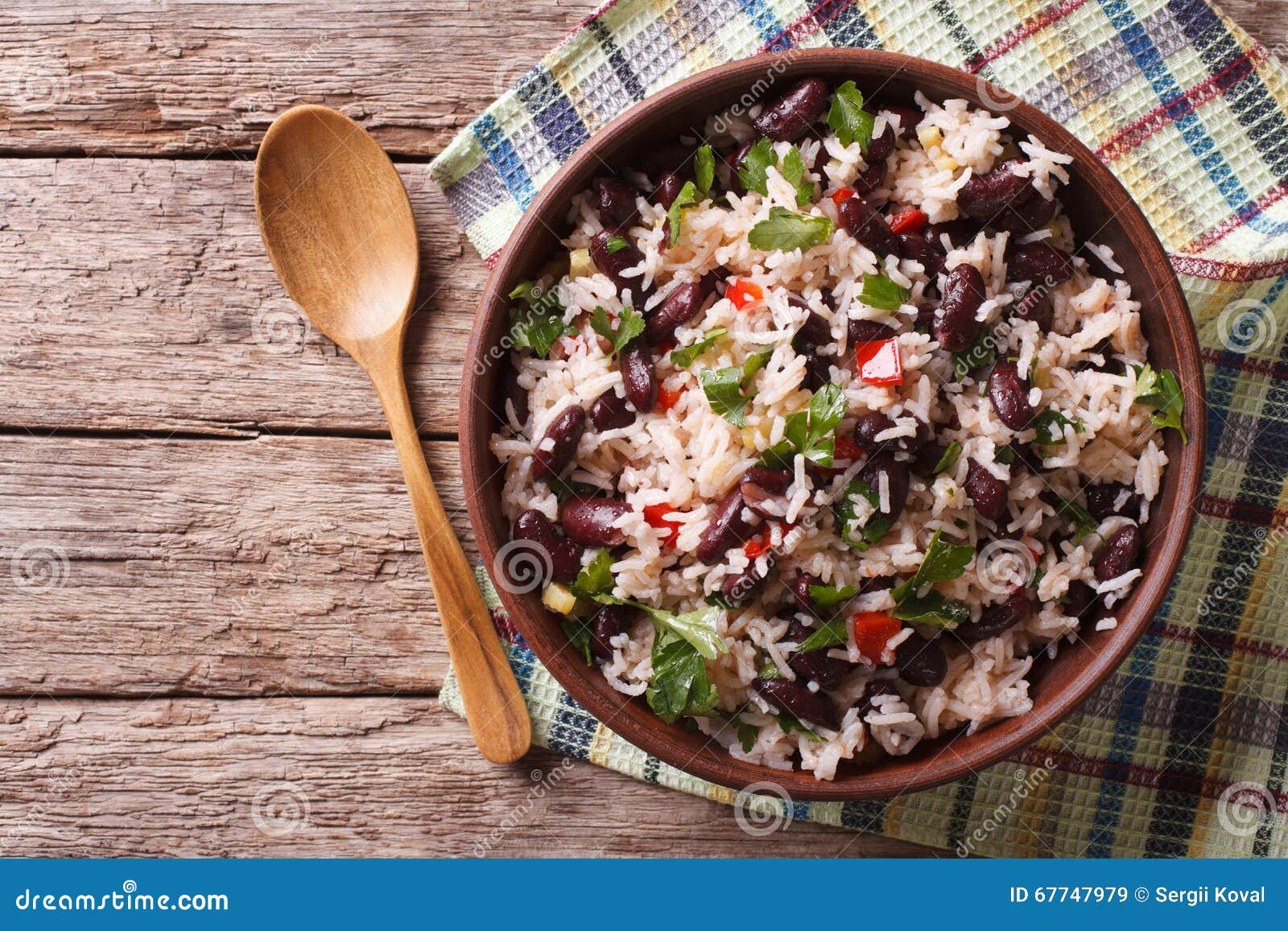 rice with red beans and vegetables in a bowl. horizontal top vie