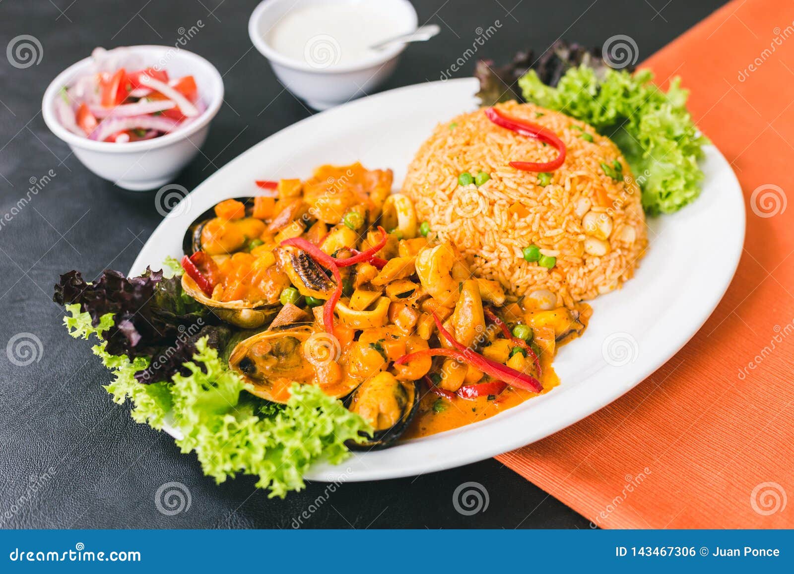 Rice with Seafood, Peruvian Sauce and Garlic Sauce Stock Photo Image