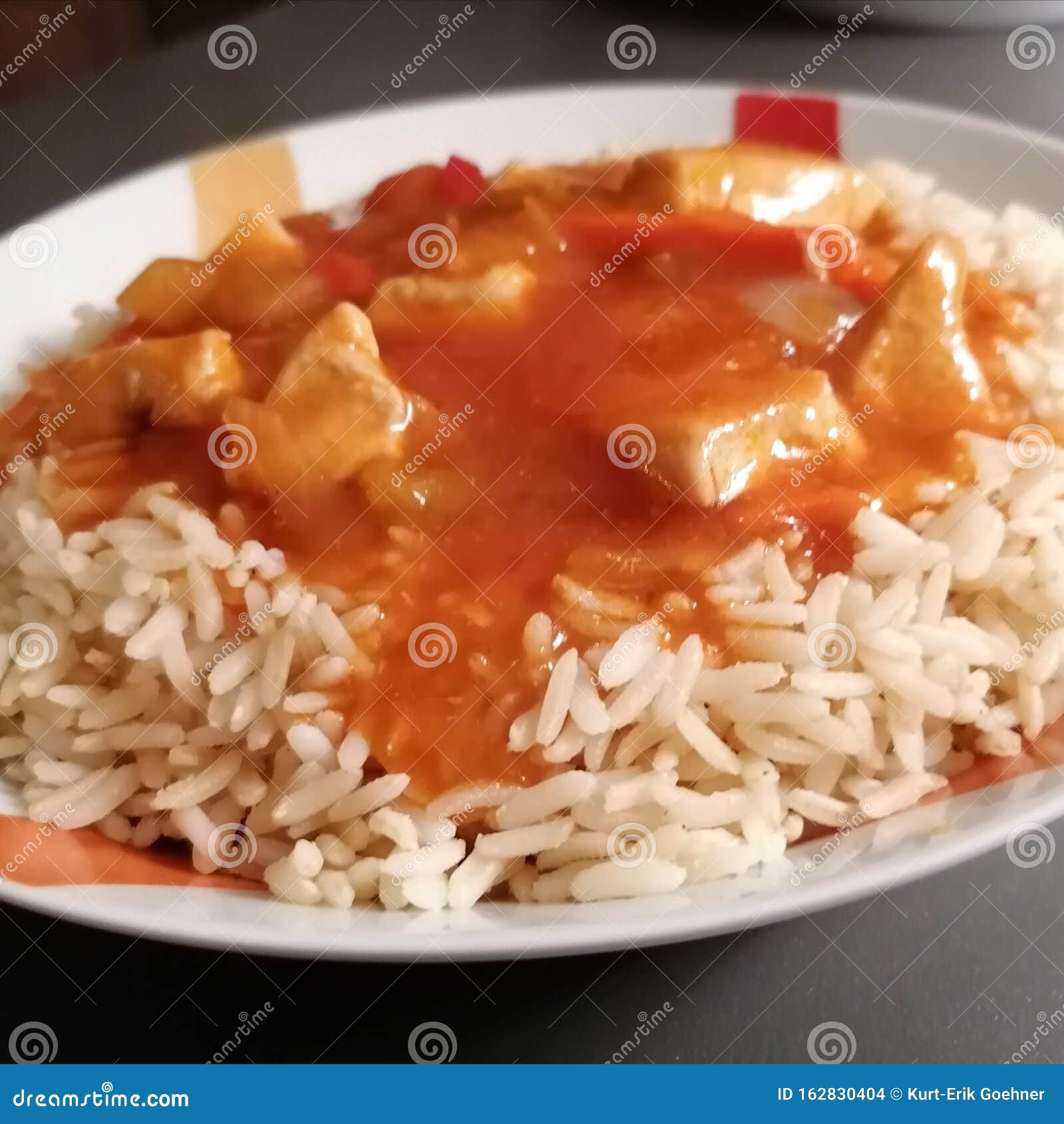 Rice with Sweet and Sour Sauce and Fried Chicken Stock Photo Image of