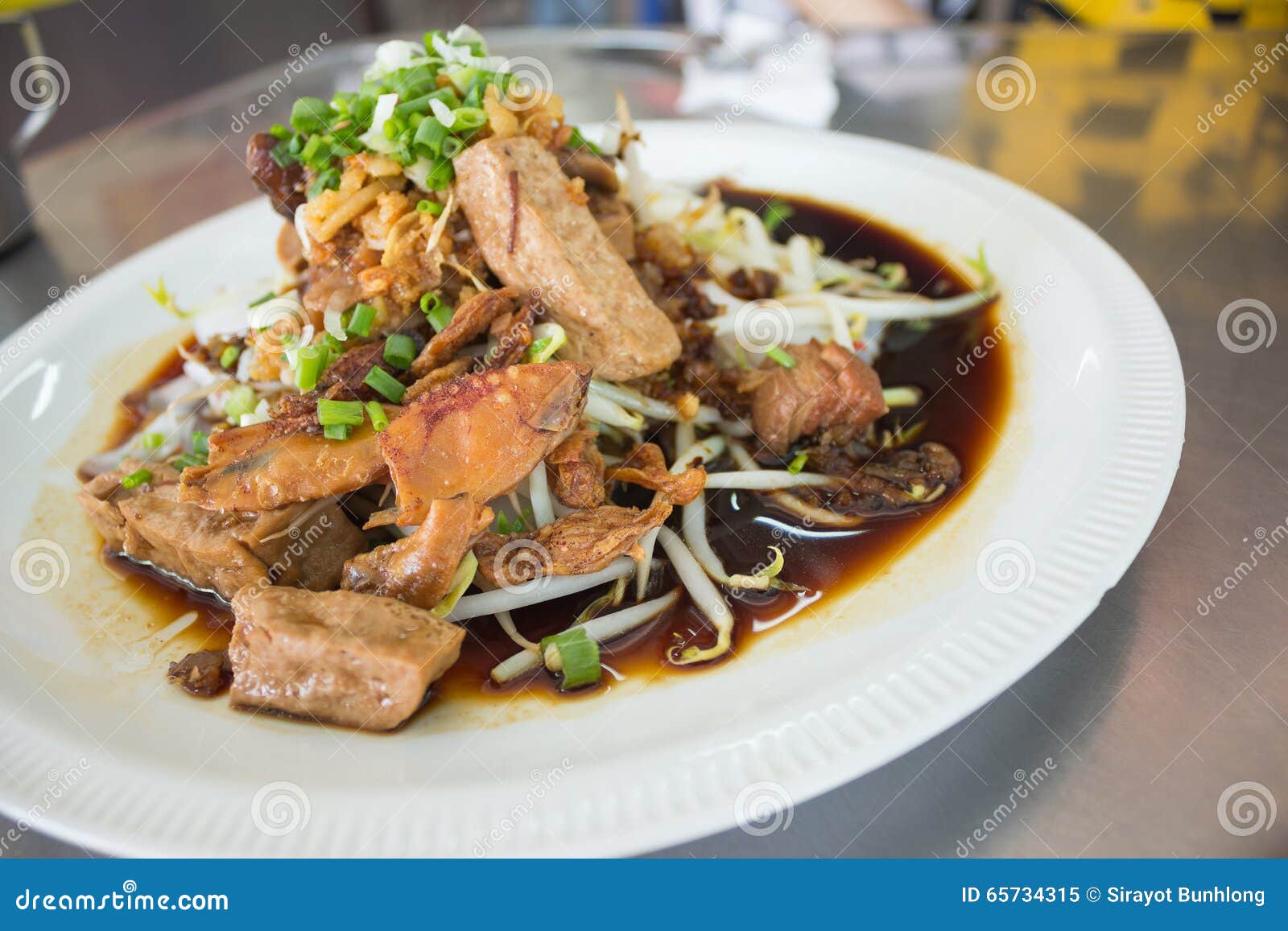 Rice Vermicelli Noodle with Brown Sauce and Bean Sprout in Dish Stock