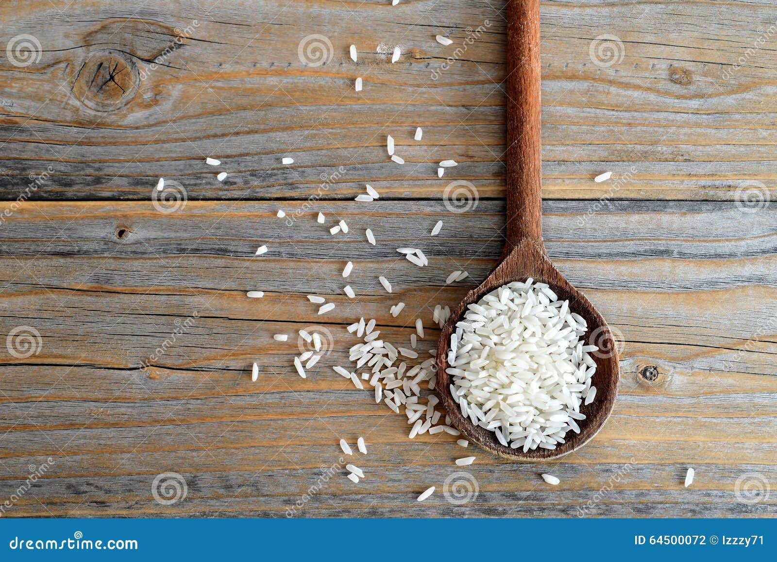 Rice in wooden spoon stock photo. Image of ingredient 64500072