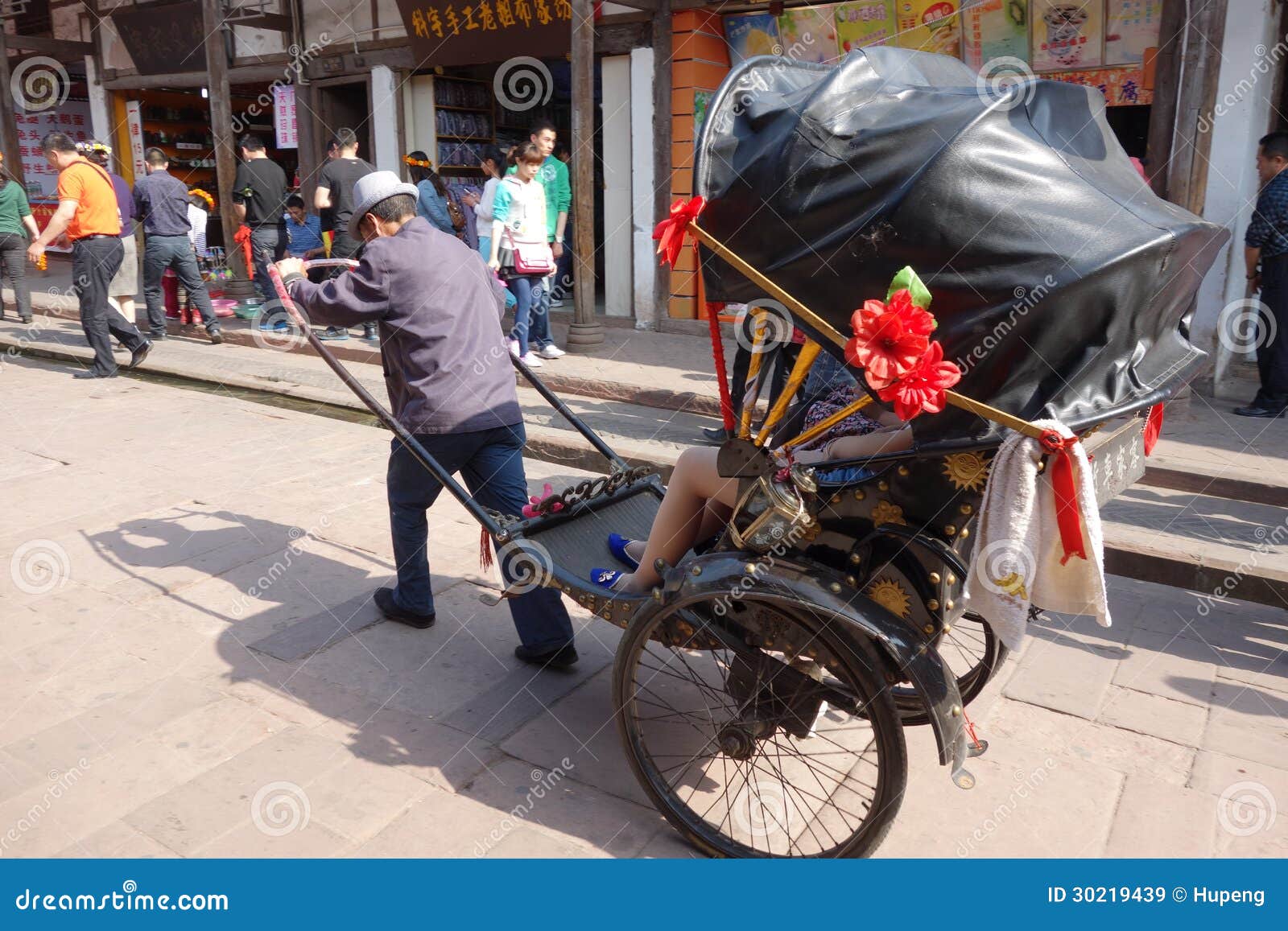 rickshaw-luodai-ancient-town-sichuan-china-30219439.jpg