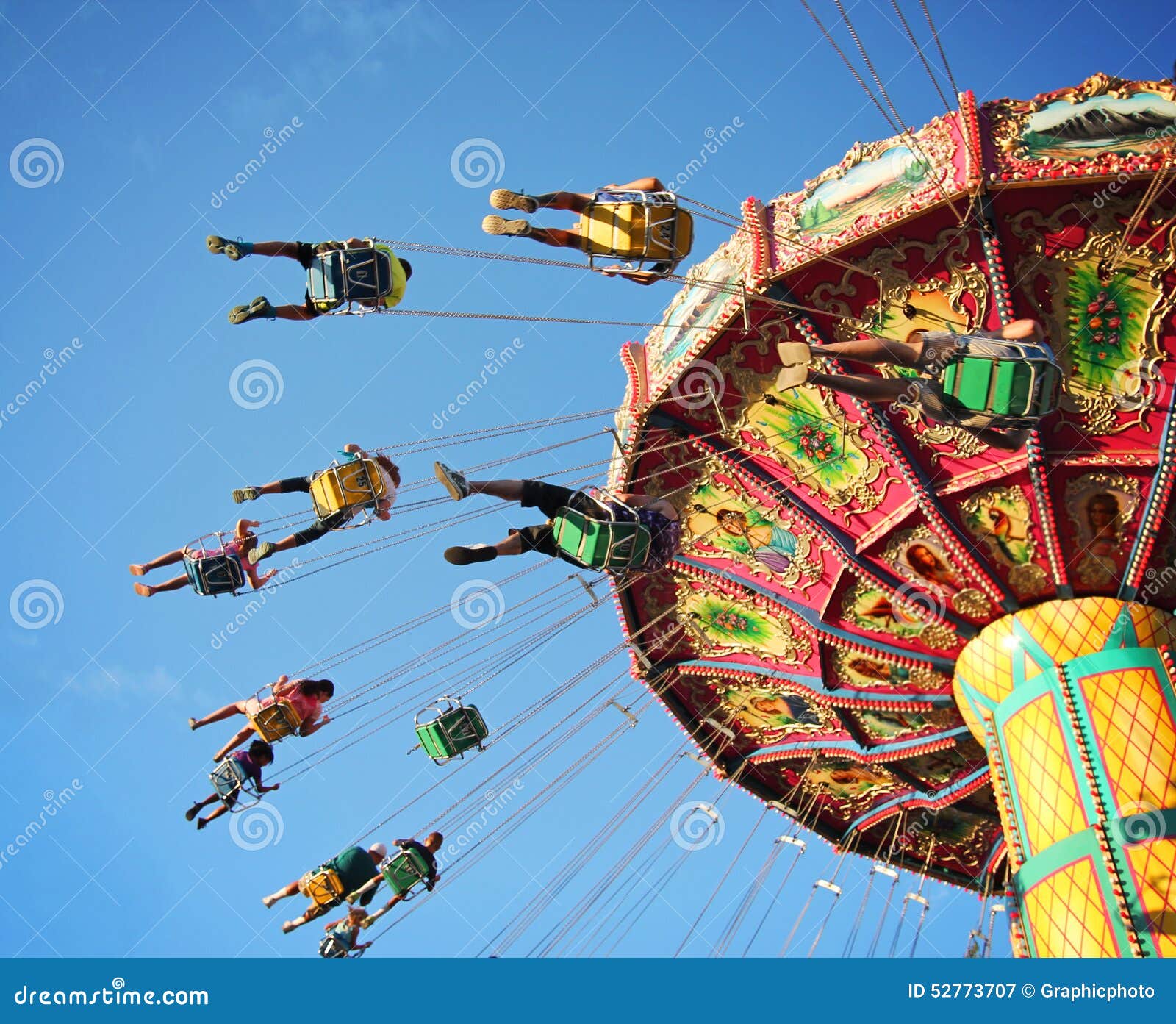 ride at fair spinning around with people having fun