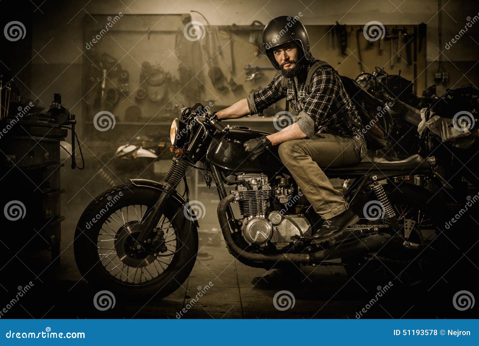 Rider And His Vintage Style Cafe-racer Motorcycle Stock ...