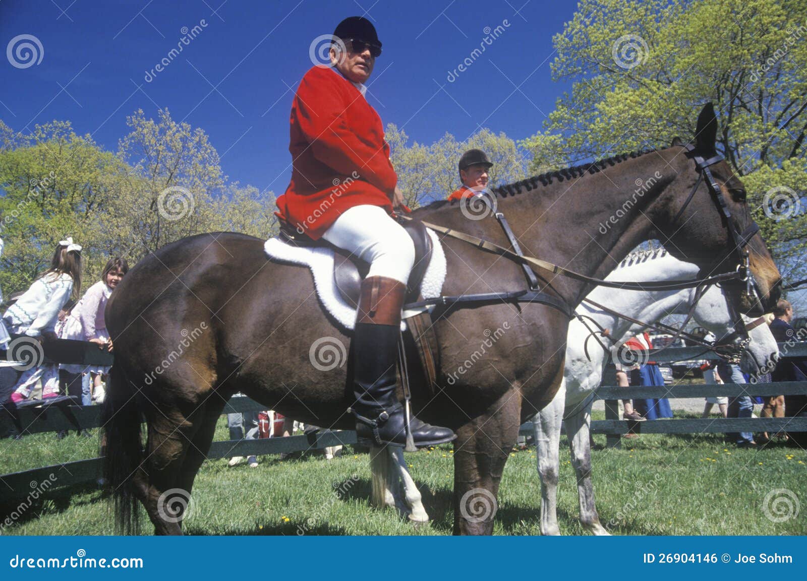Rider on Horseback Observing Steeplechase Field, Editorial Photo