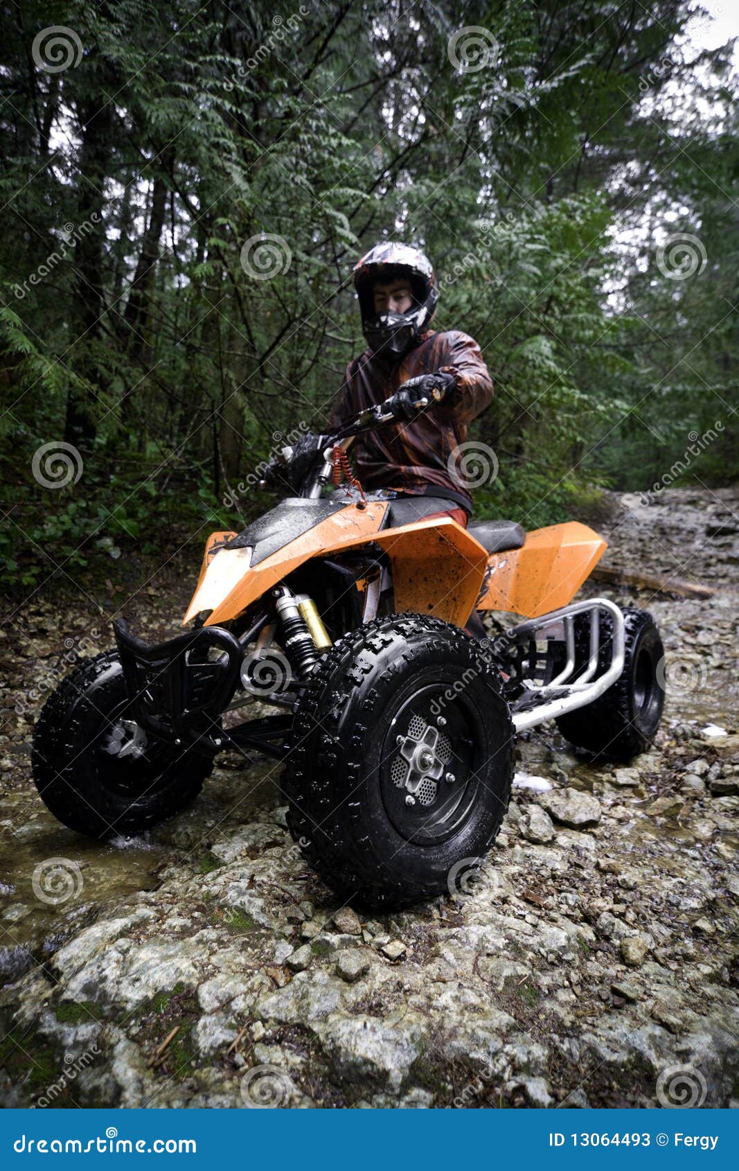 Riding ATV in mountains stock image. Image of challenge 13064493