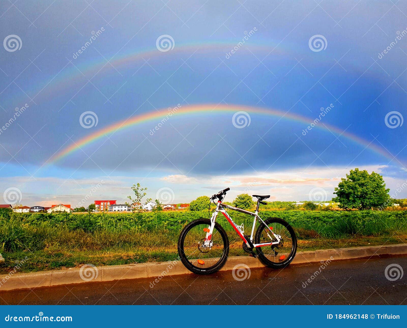 Riding the Bike To the Rainbow after Rain Editorial Stock Photo Image