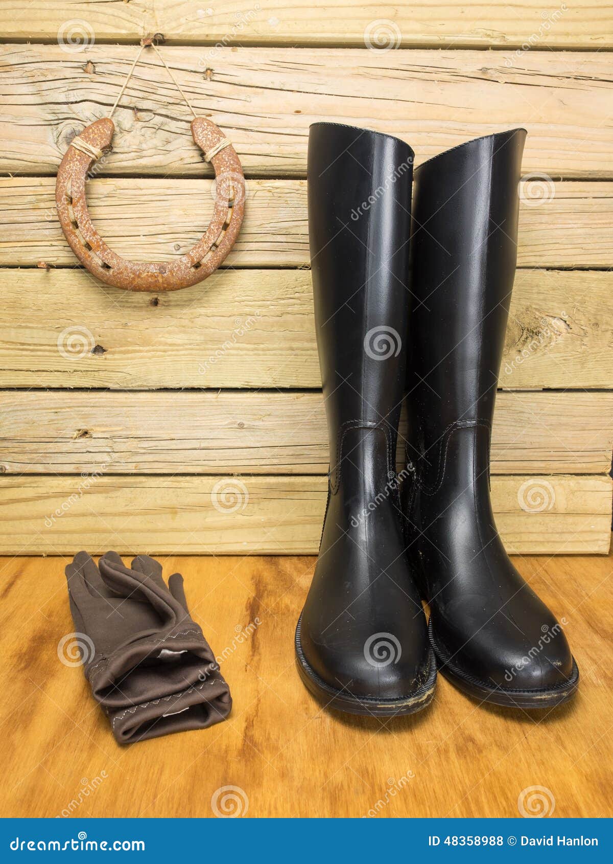 Riding Boots and Gloves in a Stable Stock Photo - Image of used, hobby ...