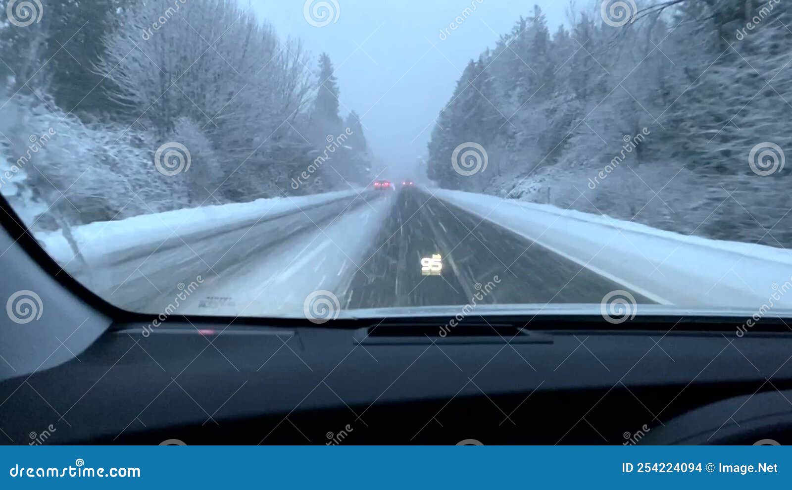 Riding through the Snow on a Highway in Abbotsford, Canada Stock