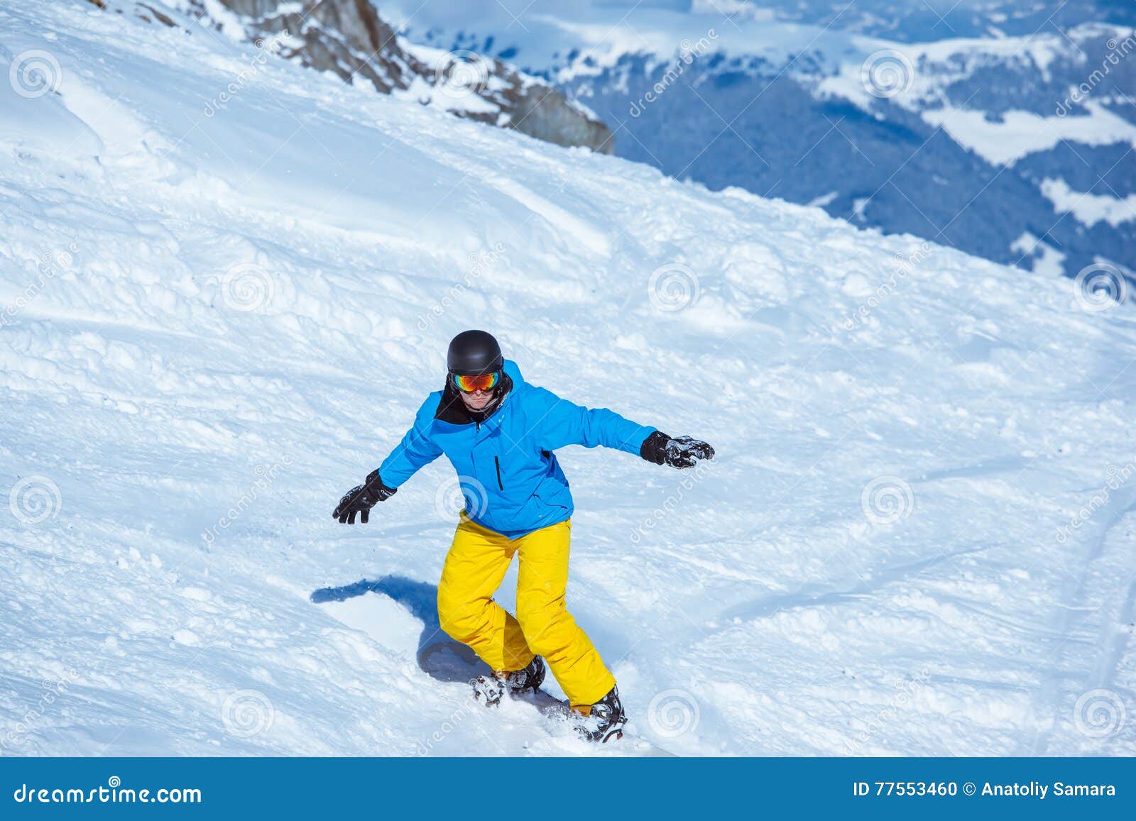 Riding a snowboard stock photo. Image of snow, activity - 77553460